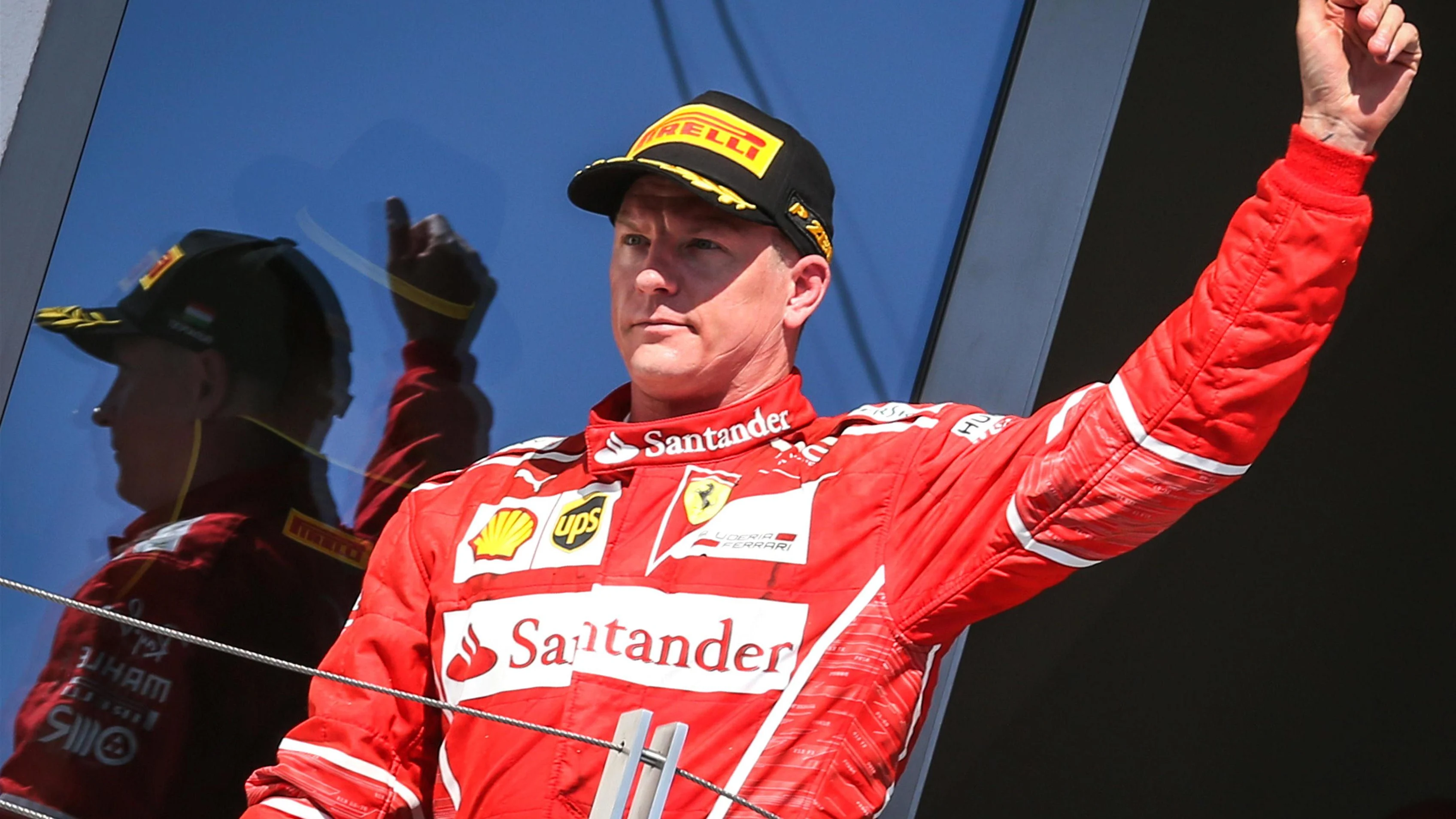 Kimi Raikkonen (FIN) Ferrari celebrates on the podium at Formula One World Championship, Rd11,