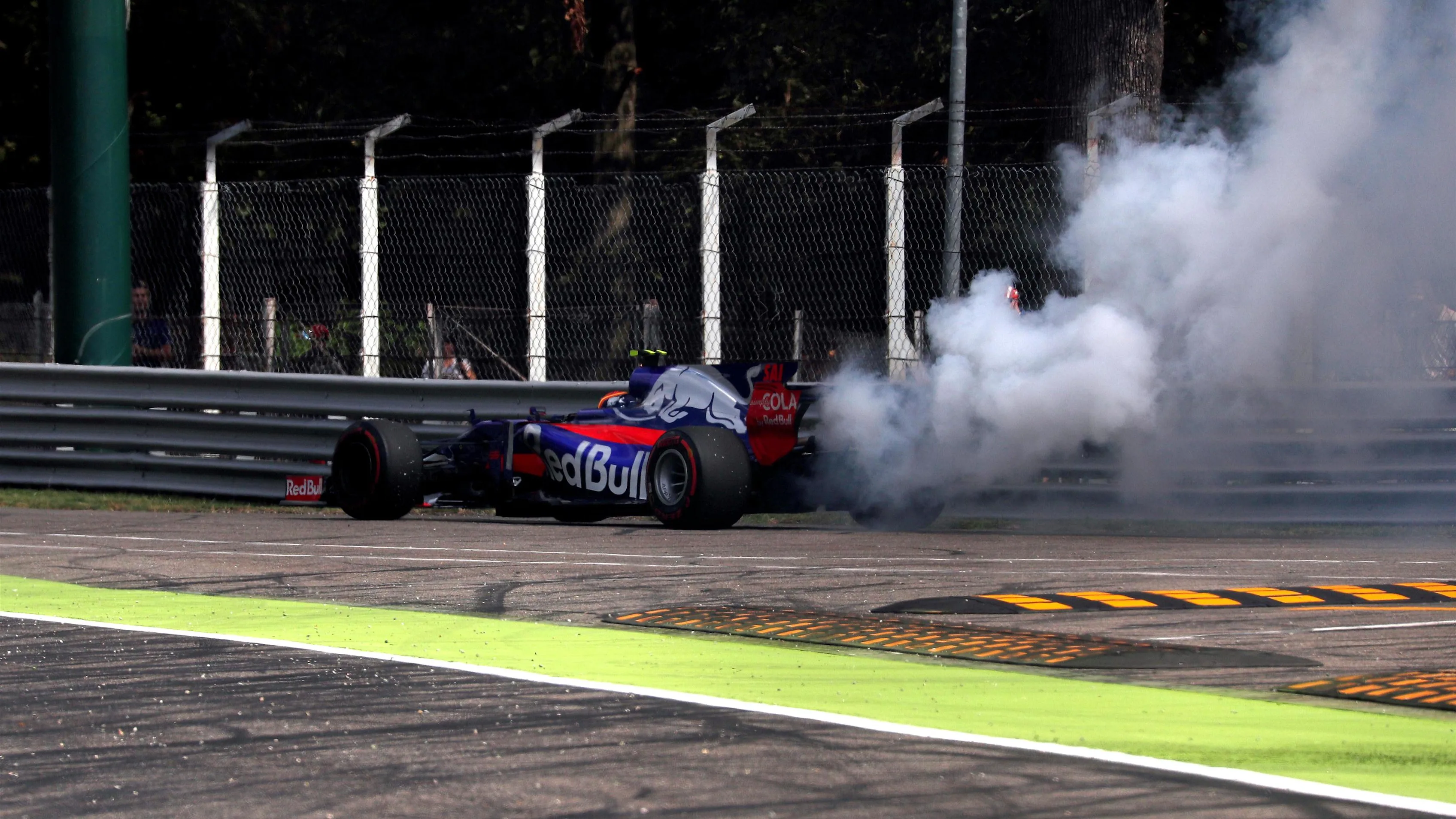 Carlos Sainz jr (ESP) Scuderia Toro Rosso STR12 stops on track in FP2 at Formula One World Championship, Rd13, Italian Grand Prix, Practice, Monza, Italy, Friday 1 September 2017. © Sutton Images