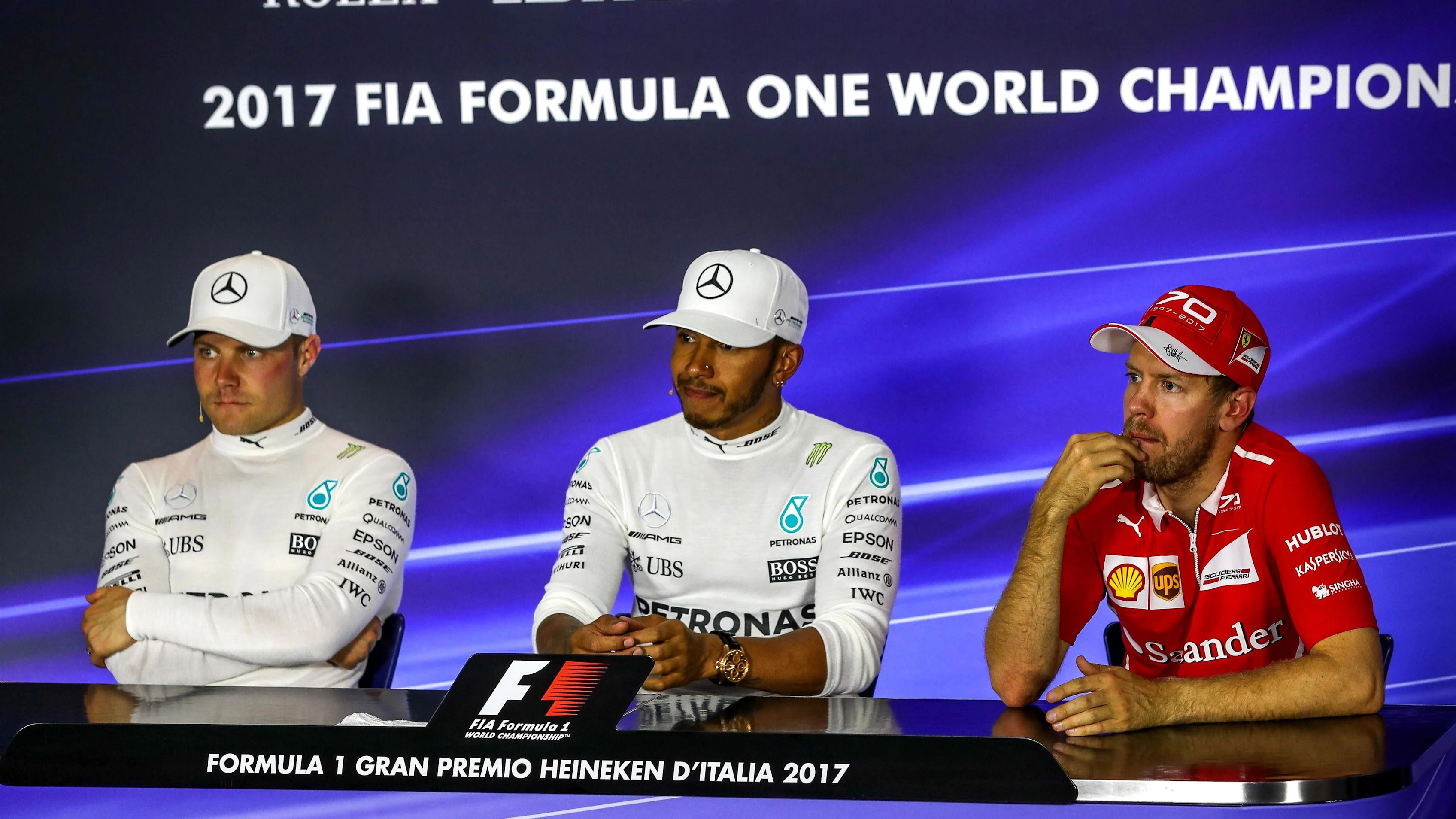 Valtteri Bottas (FIN) Mercedes AMG F1, Lewis Hamilton (GBR) Mercedes AMG F1 and Sebastian Vettel