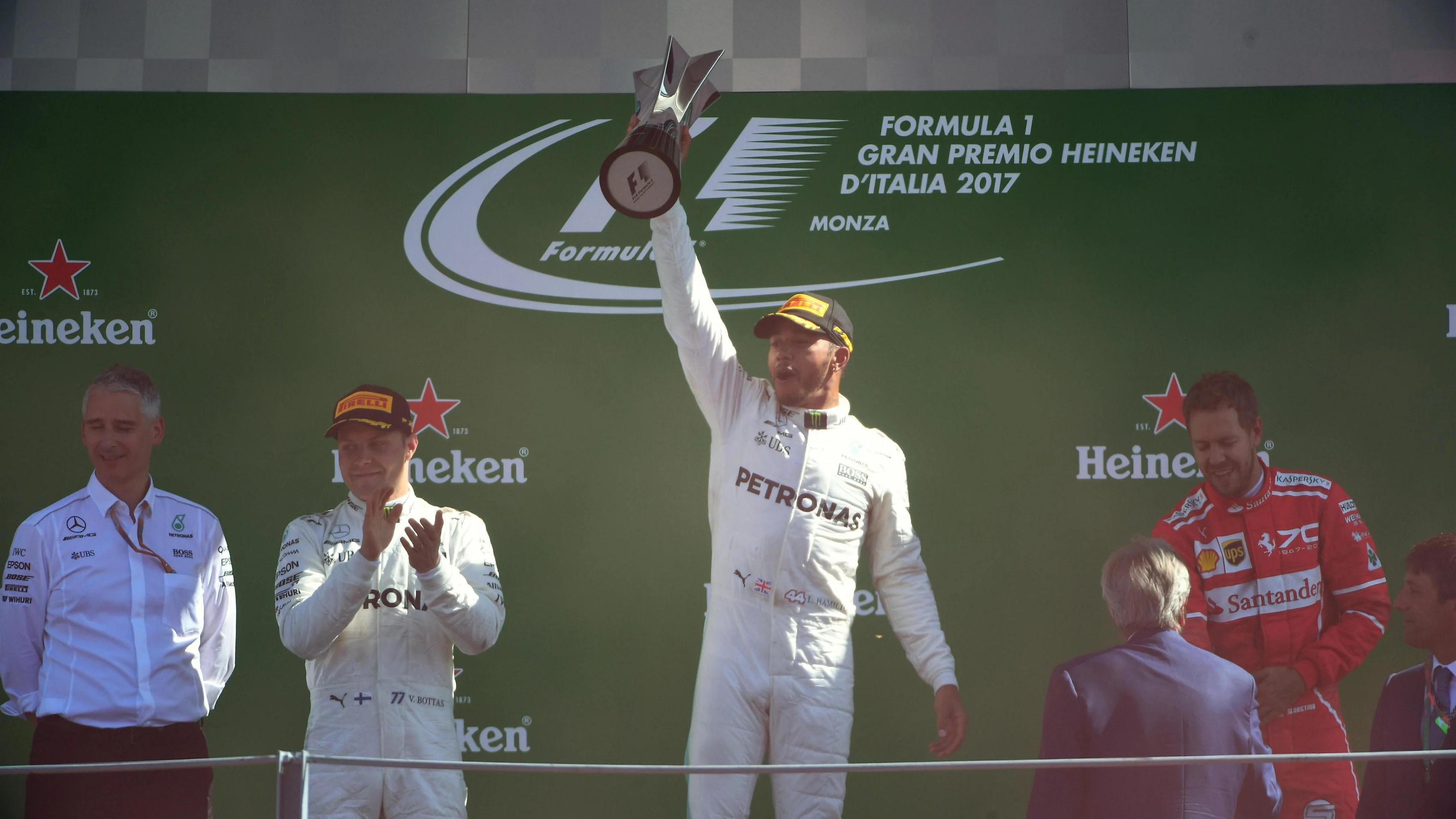 Valtteri Bottas (FIN) Mercedes AMG F1, Lewis Hamilton (GBR) Mercedes AMG F1 and Sebastian Vettel (GER) Ferrari celebrate on the podium at Formula One World Championship, Rd13, Italian Grand Prix, Race, Monza, Italy, Sunday 3 September 2017. © Sutton Image