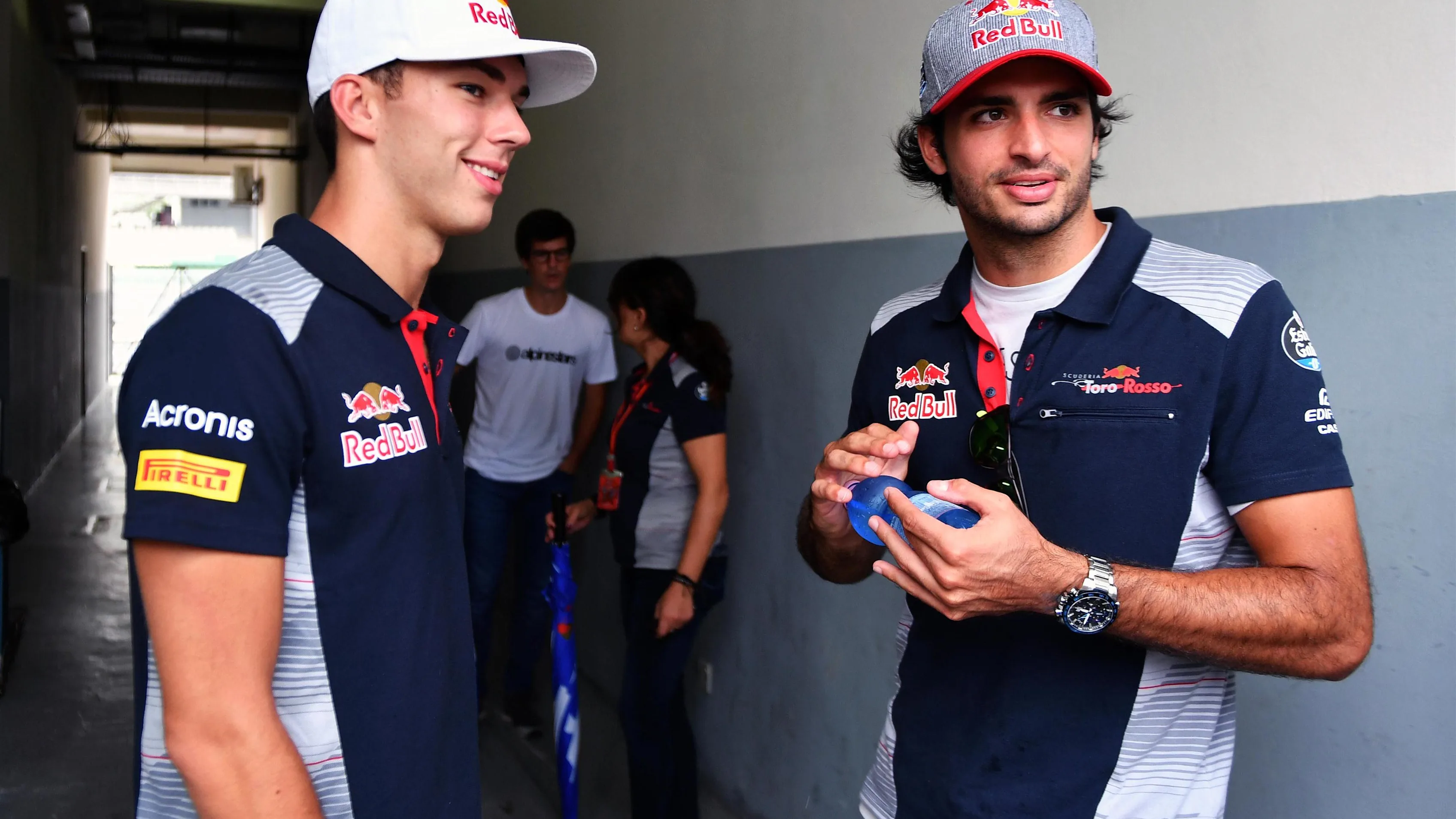 Pierre Gasly (FRA) Scuderia Toro Rosso and Carlos Sainz jr (ESP) Scuderia Toro Rosso at Formula One