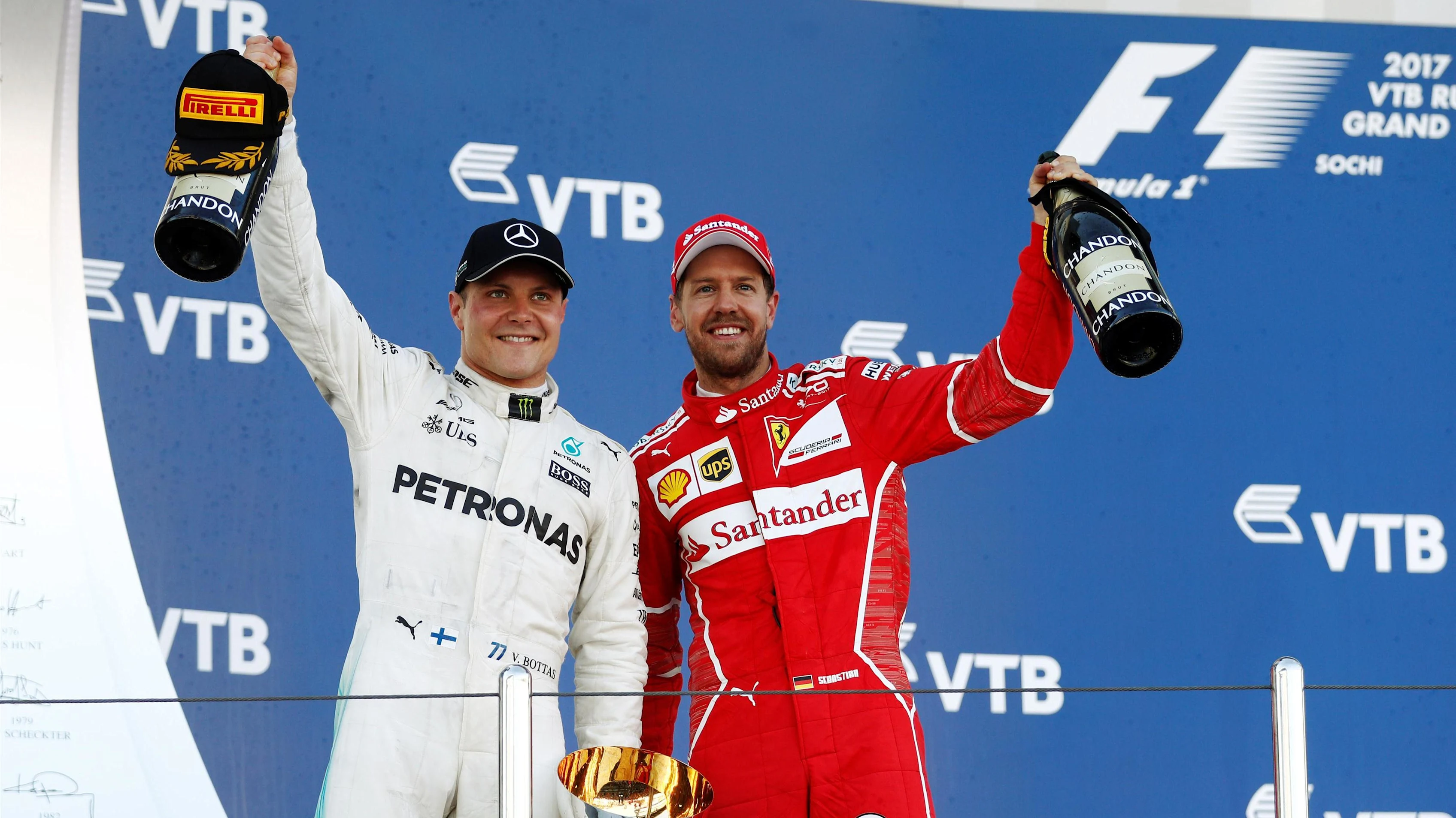 Race winner Valtteri Bottas (FIN) Mercedes AMG F1 and Sebastian Vettel (GER) Ferrari celebrate on the podium with the trophies at Formula One World Championship, Rd4, Russian Grand Prix, Race, Sochi Autodrom, Sochi, Krasnodar Krai, Russia, Sunday 30 April 2017. © Sutton Motorsport Images