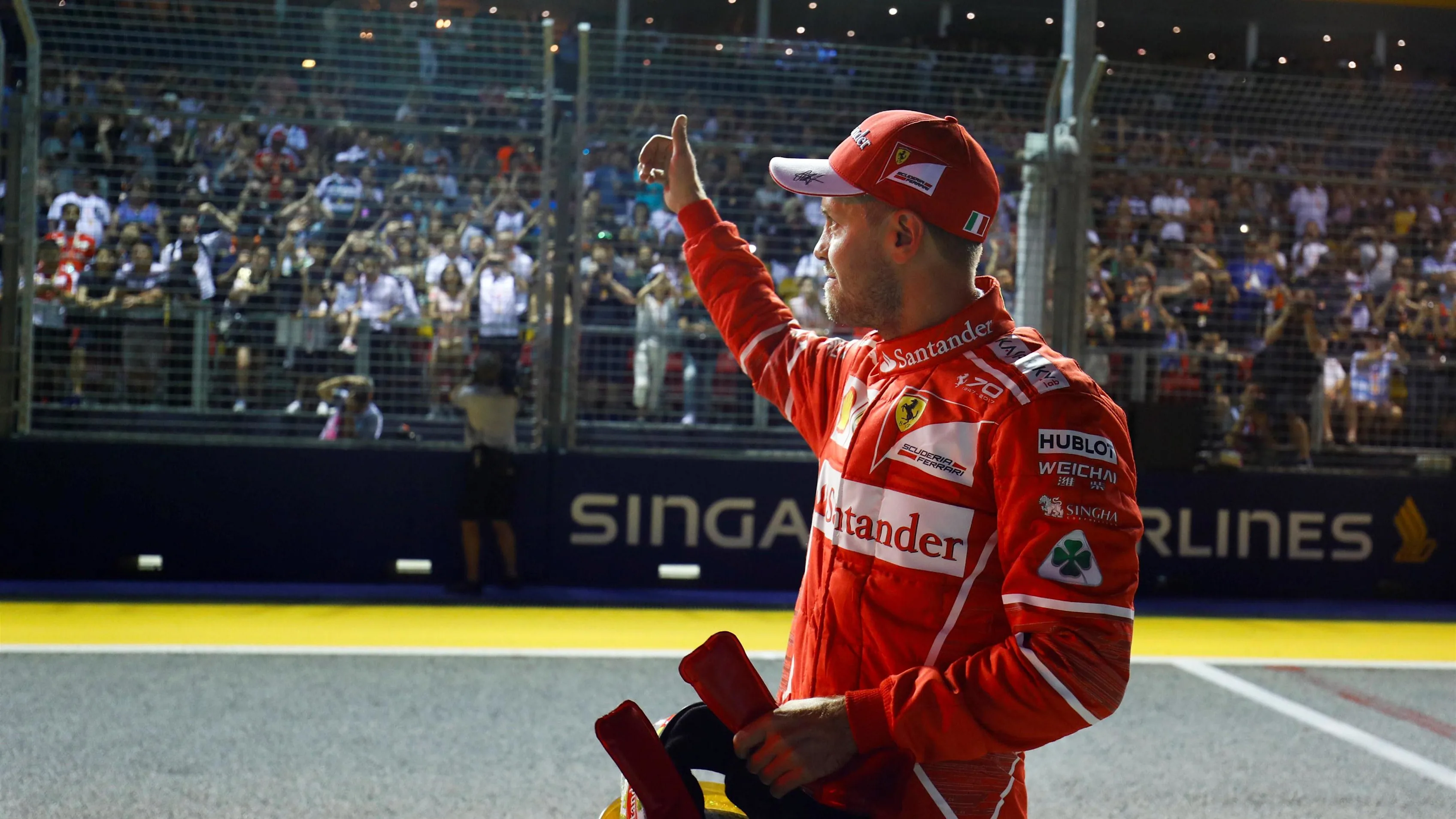 Pole sitter Sebastian Vettel (GER) Ferrari celebrates in parc ferme at Formula One World Championship, Rd14, Singapore Grand Prix, Qualifying, Marina Bay Street Circuit, Singapore, Saturday 16 September 2017. © Sutton Images
