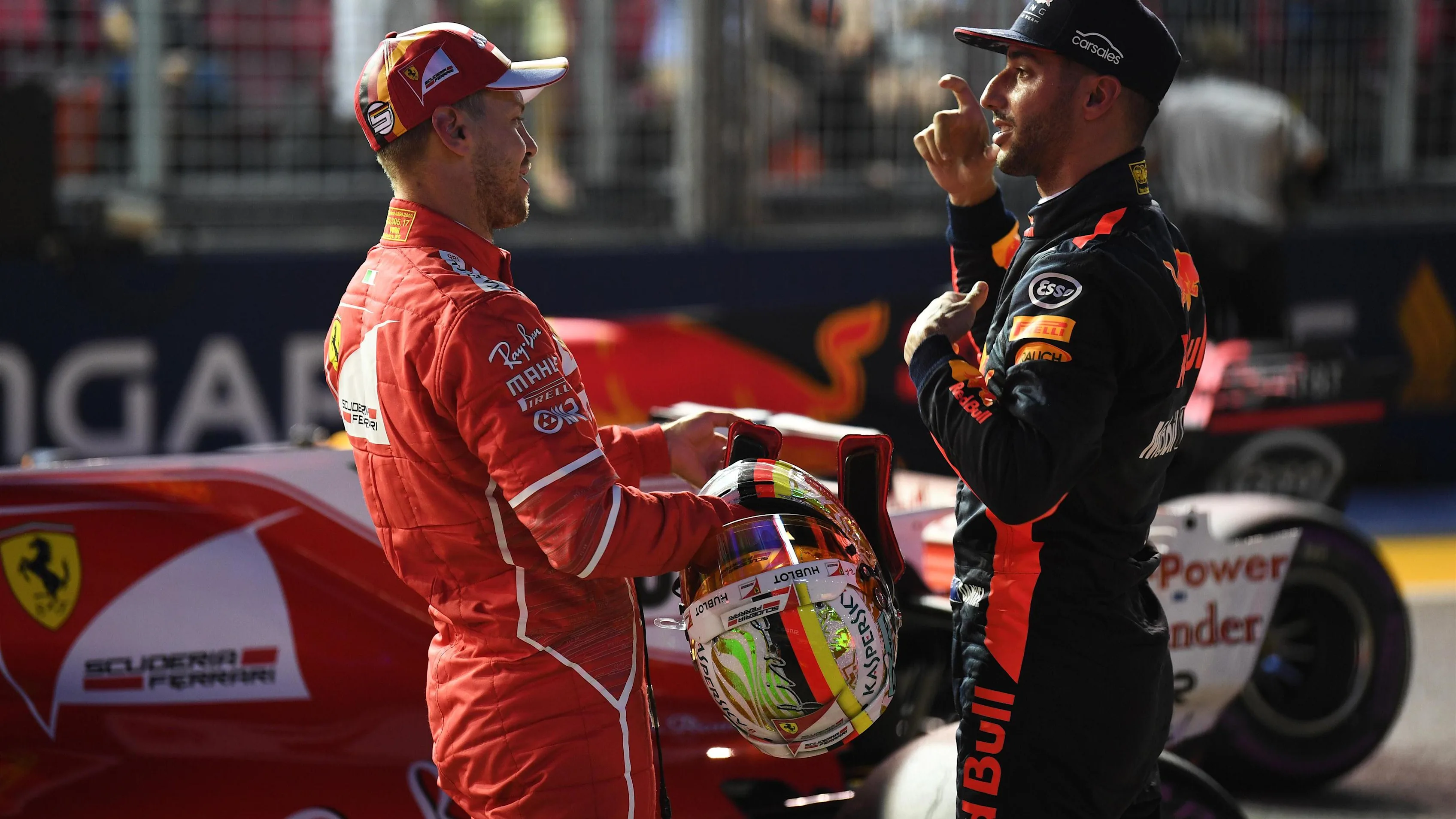 Pole sitter Sebastian Vettel (GER) Ferrari and Daniel Ricciardo (AUS) Red Bull Racing in parc ferme at Formula One World Championship, Rd14, Singapore Grand Prix, Qualifying, Marina Bay Street Circuit, Singapore, Saturday 16 September 2017. © Sutton Images