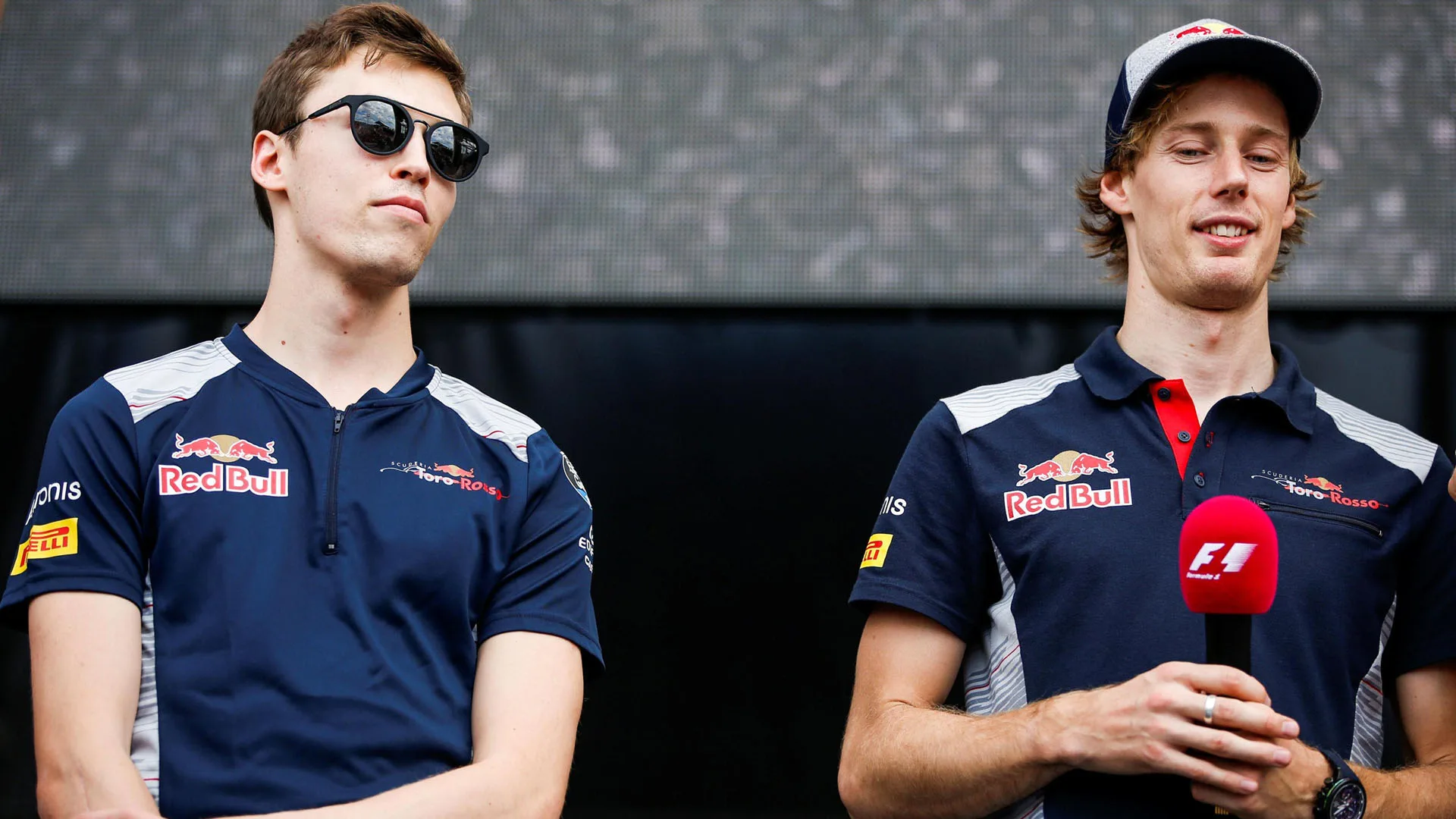 Daniil Kvyat (RUS) Scuderia Toro Rosso aqnd Brendon Hartley (NZL) Scuderia Toro Rosso at Formula