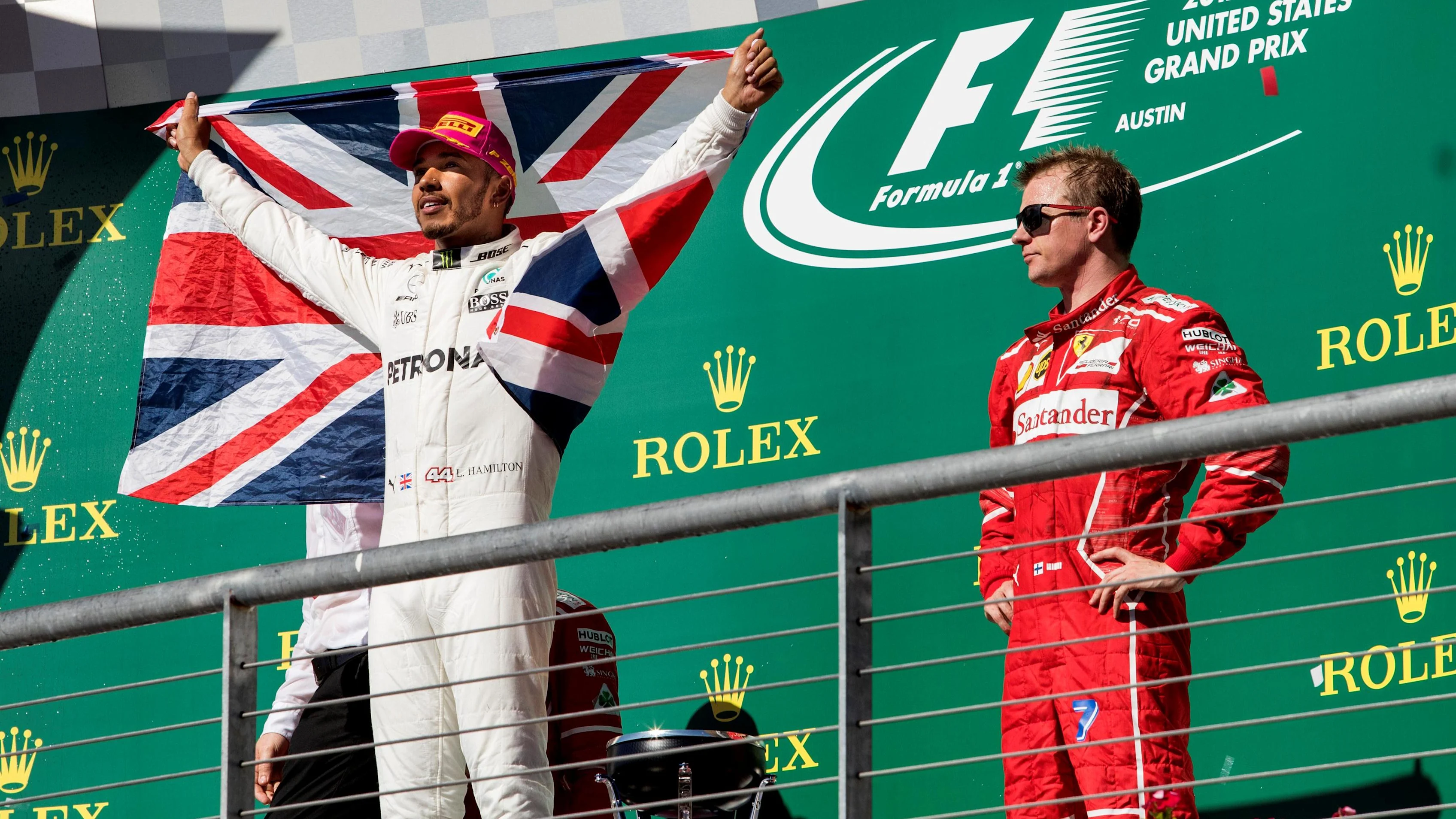 Race winner Lewis Hamilton (GBR) Mercedes AMG F1 and Kimi Raikkonen (FIN) Ferrari celebrate on the podium with the Union Jack Flag at Formula One World Championship, Rd17, United States Grand Prix, Race, Circuit of the Americas, Austin, Texas, USA, Sunday