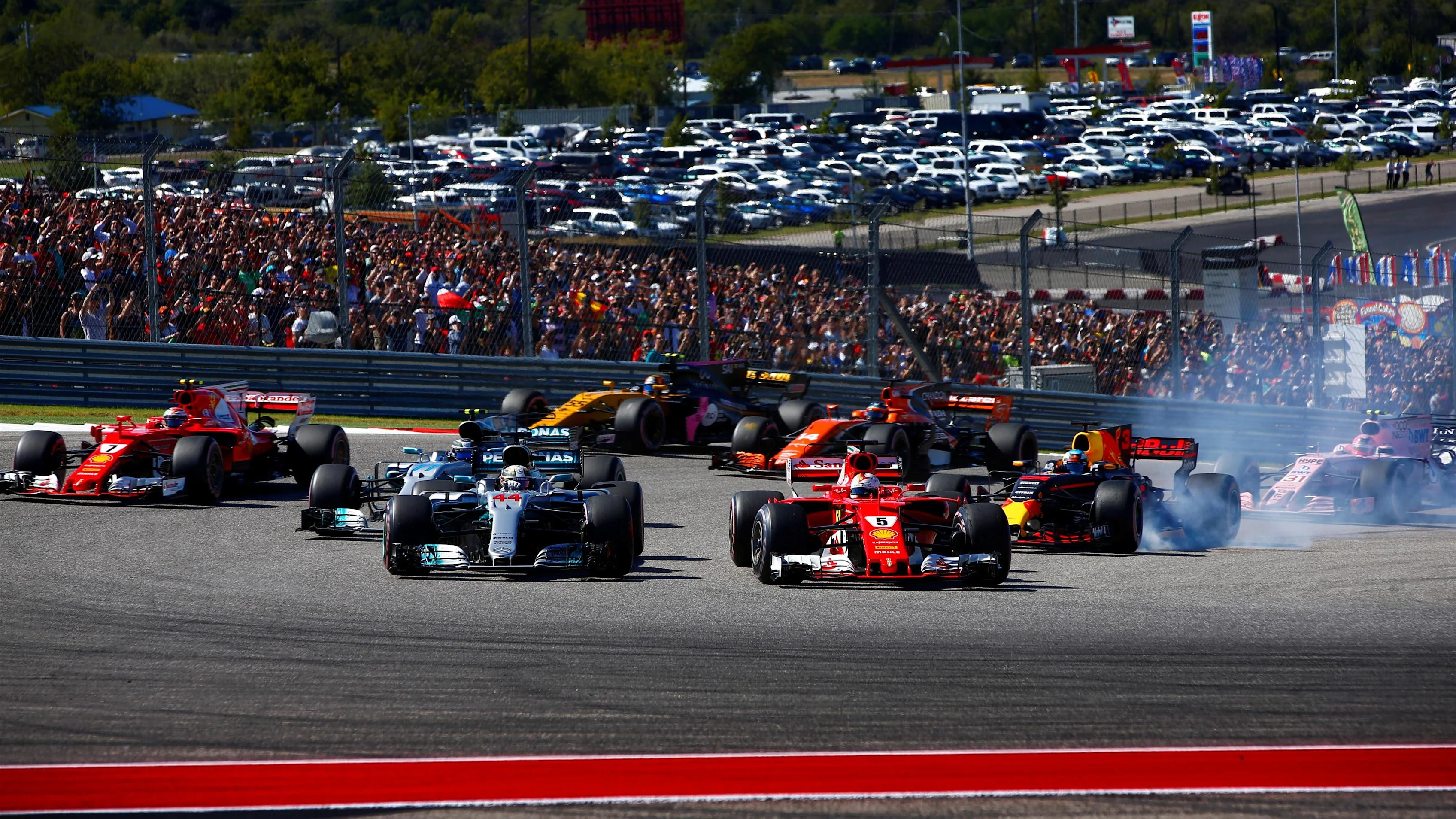 Sebastian Vettel (GER) Ferrari SF70-H and Lewis Hamilton (GBR) Mercedes-Benz F1 W08 Hybrid at the
