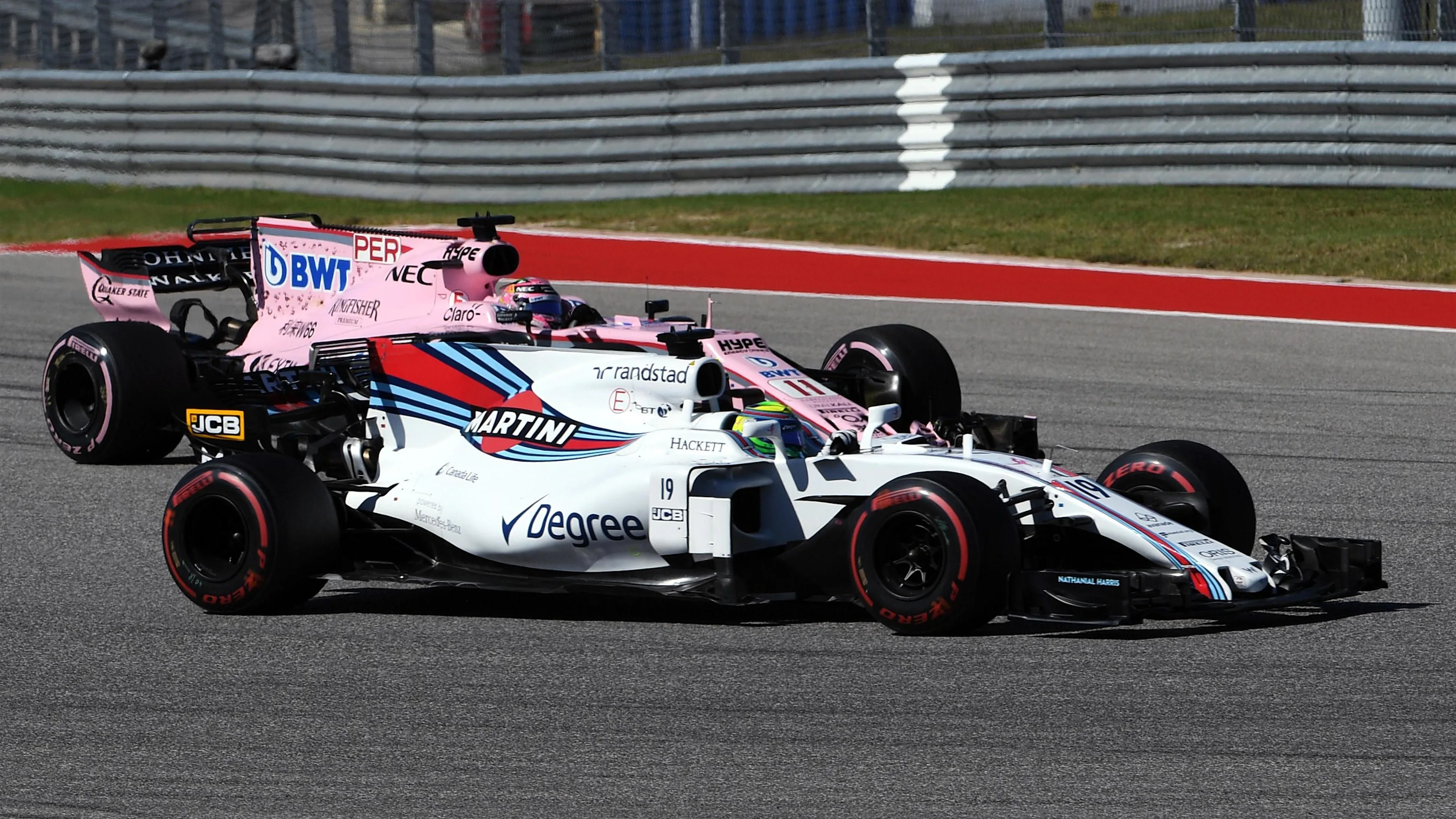 Felipe Massa (BRA) Williams FW40 and Sergio Perez (MEX) Force India VJM10 battle at Formula One World Championship, Rd17, United States Grand Prix, Race, Circuit of the Americas, Austin, Texas, USA, Sunday 22 October 2017. © Mark Sutton/Sutton Images