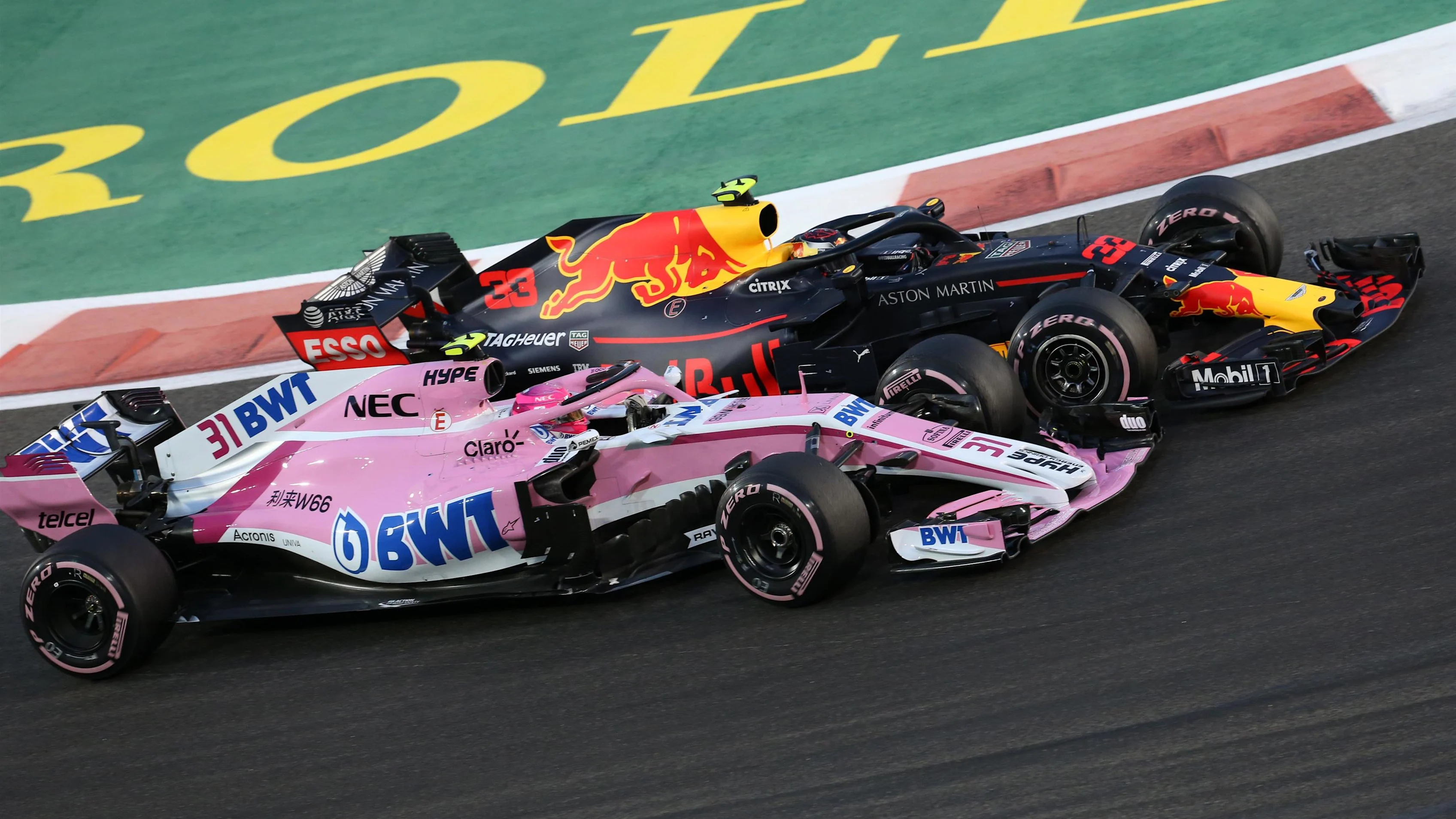 Esteban Ocon, Racing Point Force India VJM11 and Max Verstappen, Red Bull Racing RB14 battle at Formula One World Championship, Rd21, Abu Dhabi Grand Prix, Race, Yas Marina Circuit, Abu Dhabi, UAE, Sunday 25 November 2018.