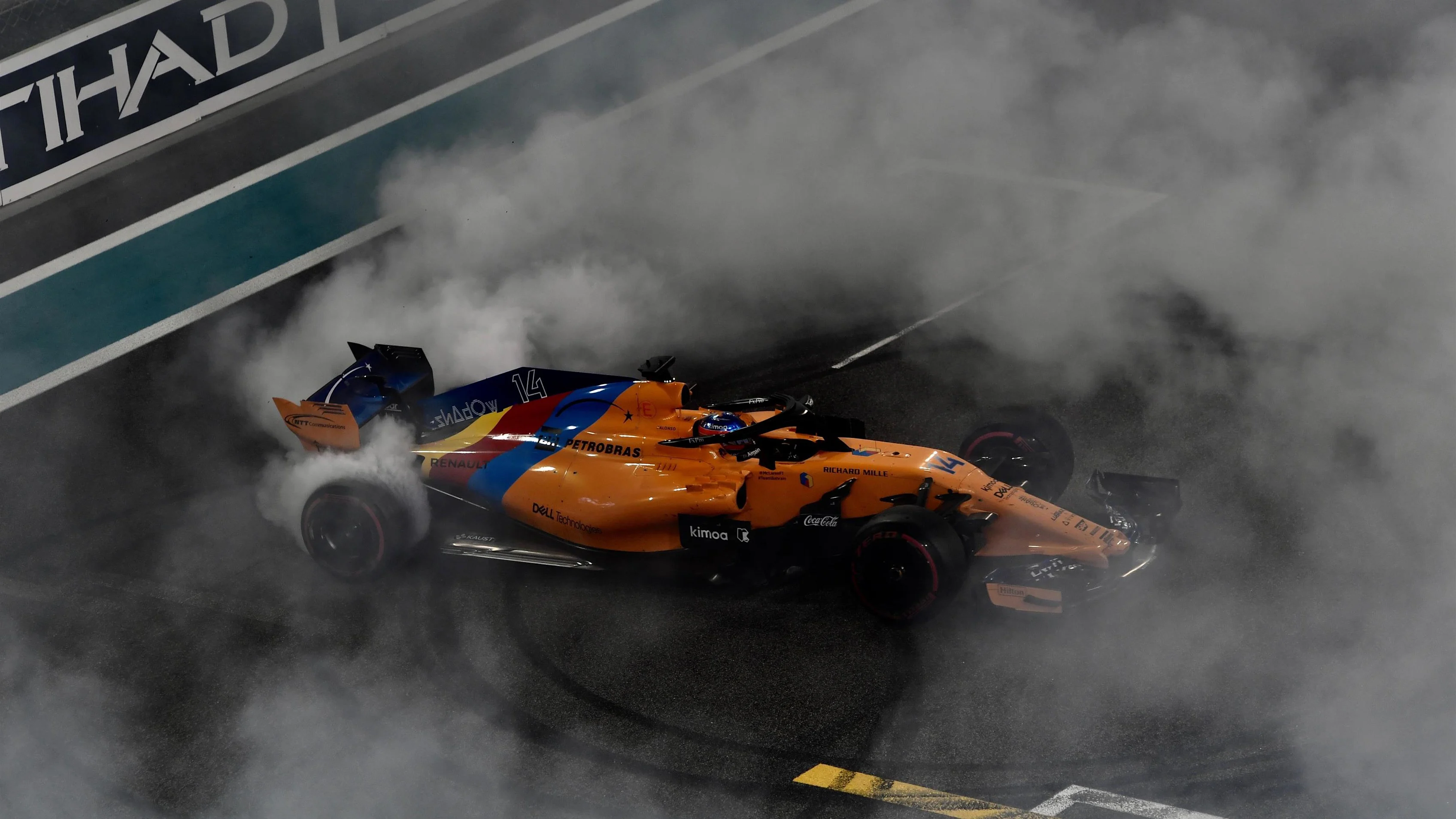Fernando Alonso, McLaren MCL33 donuts at the end of the race at Formula One World Championship, Rd21, Abu Dhabi Grand Prix, Race, Yas Marina Circuit, Abu Dhabi, UAE, Sunday 25 November 2018.