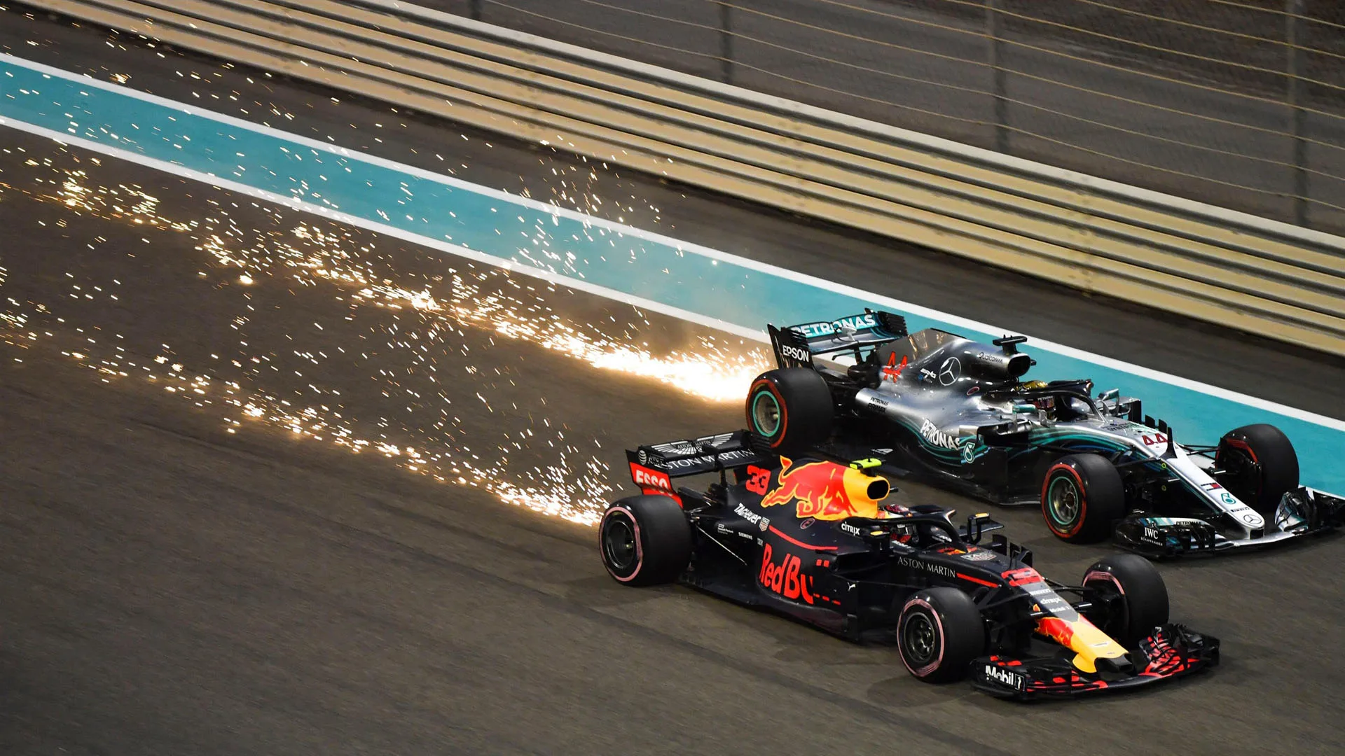 Max Verstappen, Red Bull Racing RB14 and Lewis Hamilton, Mercedes-AMG F1 W09 EQ Power+ sparks and