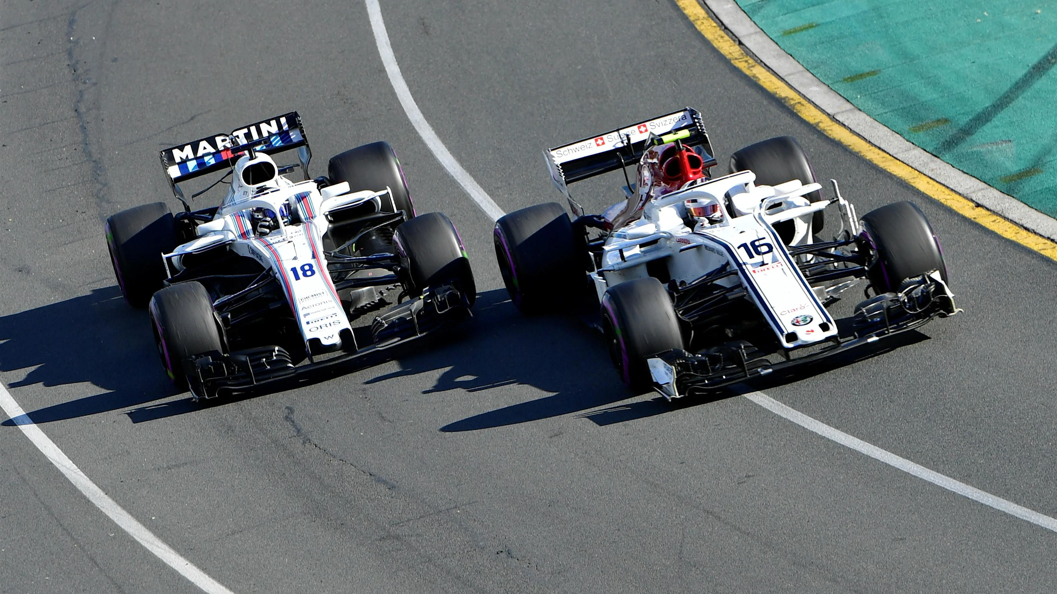 Charles Leclerc (MON) Alfa Romeo Sauber C37 and Sergey Sirotkin (RUS) Williams FW41 battle at Formula One World Championship, Rd1, Australian Grand Prix, Race, Melbourne, Australia, Sunday 25 March 2018. © Jerry Andre/Sutton Images