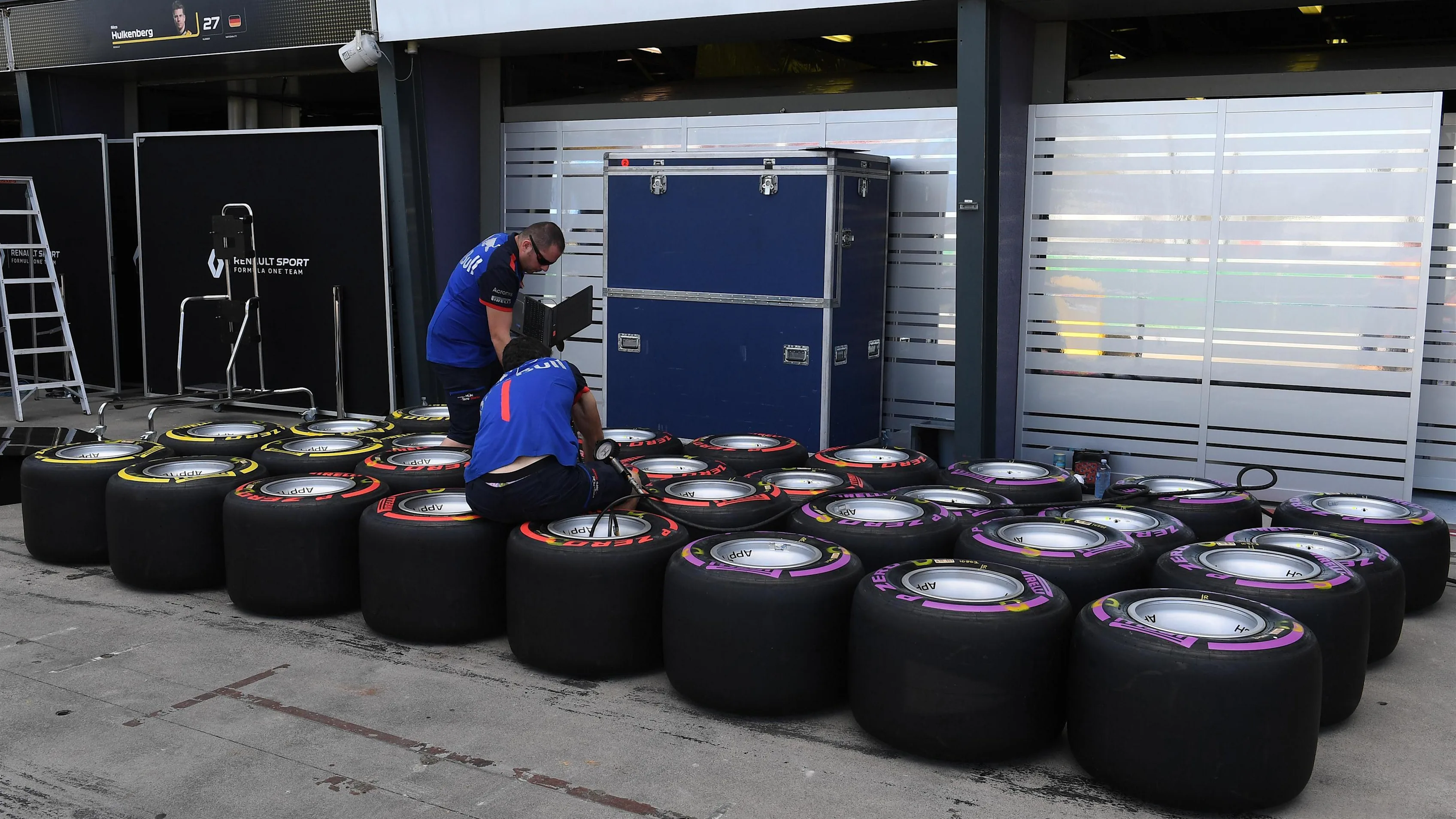 Scuderia Toro Rosso mechanics and Pirelli tyres at Formula One World Championship, Rd1, Australian Grand Prix, Preparations, Melbourne, Australia, Wednesday 21 March 2018. © Mark Sutton/Sutton Images