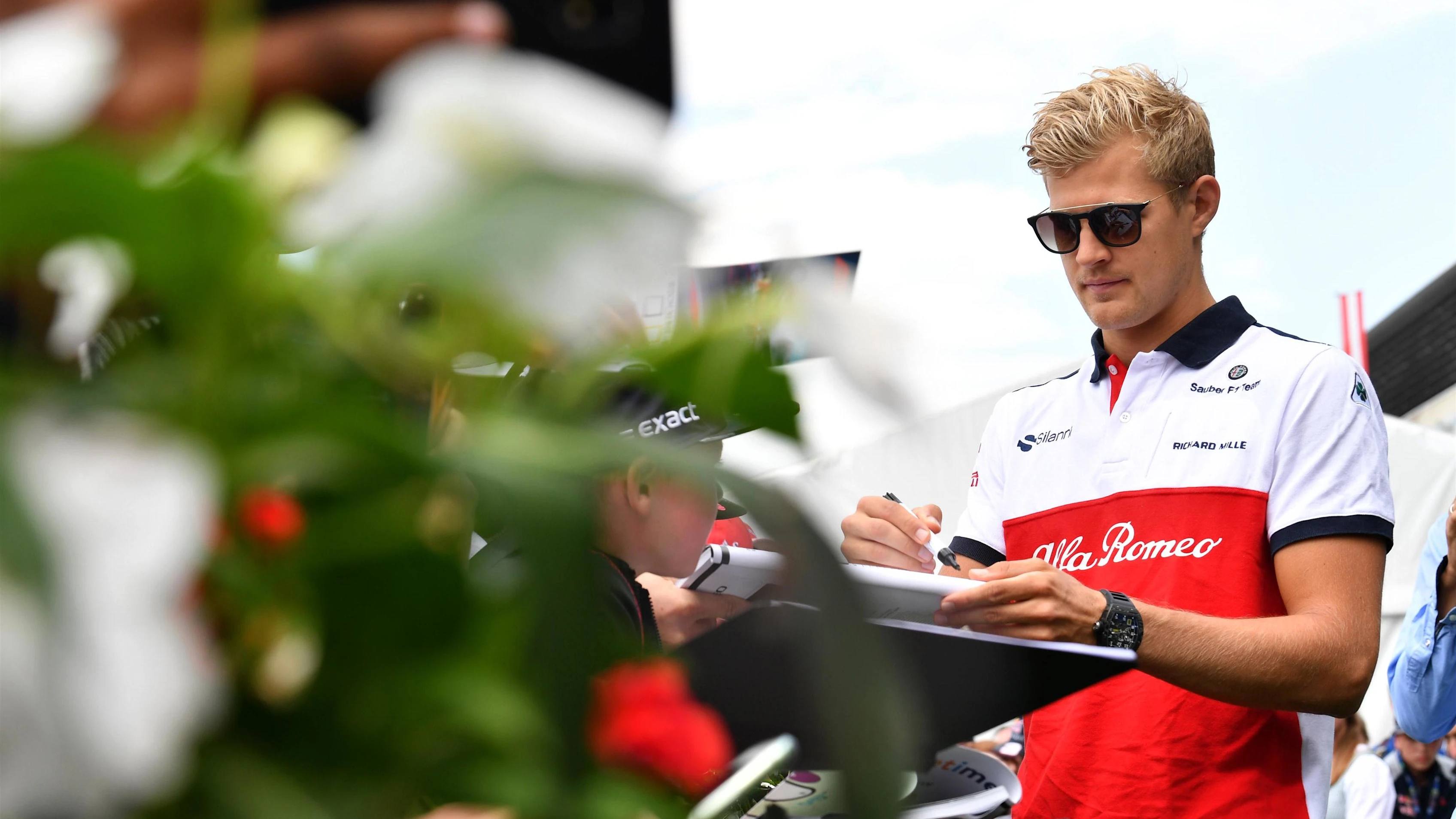 Marcus Ericsson (SWE) Alfa Romeo Sauber F1 Team signs autographs for the fans at Formula One World Championship, Rd9, Austrian Grand Prix, Qualifying, Spielberg, Austria, Saturday 30 June 2018. © Mark Sutton/Sutton Images
