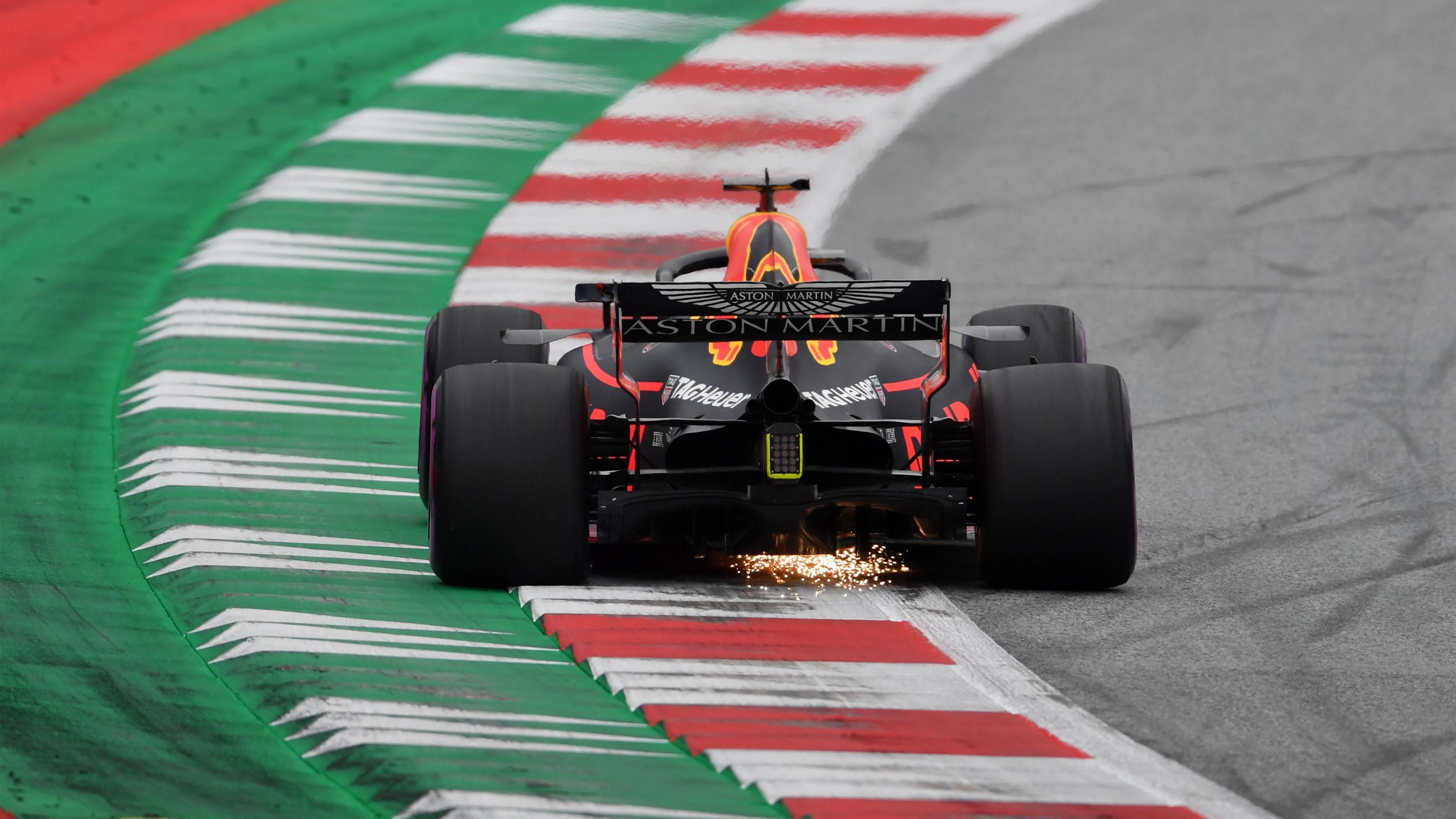 Daniel Ricciardo (AUS) Red Bull Racing RB14 sparks at Formula One World Championship, Rd9, Austrian