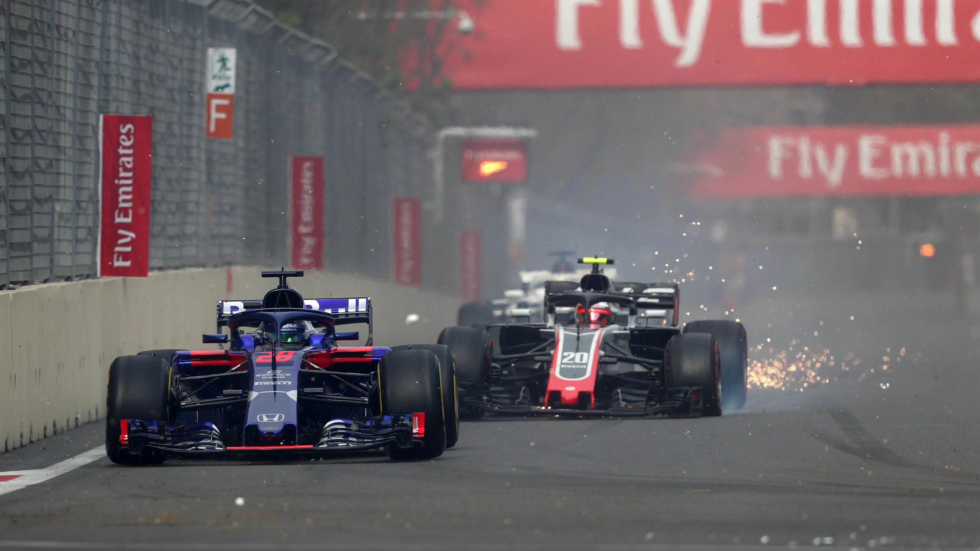 Pierre Gasly (FRA) Scuderia Toro Rosso STR13 and Kevin Magnussen (DEN) Haas VF-18 with damage at Formula One World Championship, Rd4, Azerbaijan Grand Prix, Race, Baku City Circuit, Baku, Azerbaijan, Sunday 29 April 2018. © James Gasperotti/Sutton Images