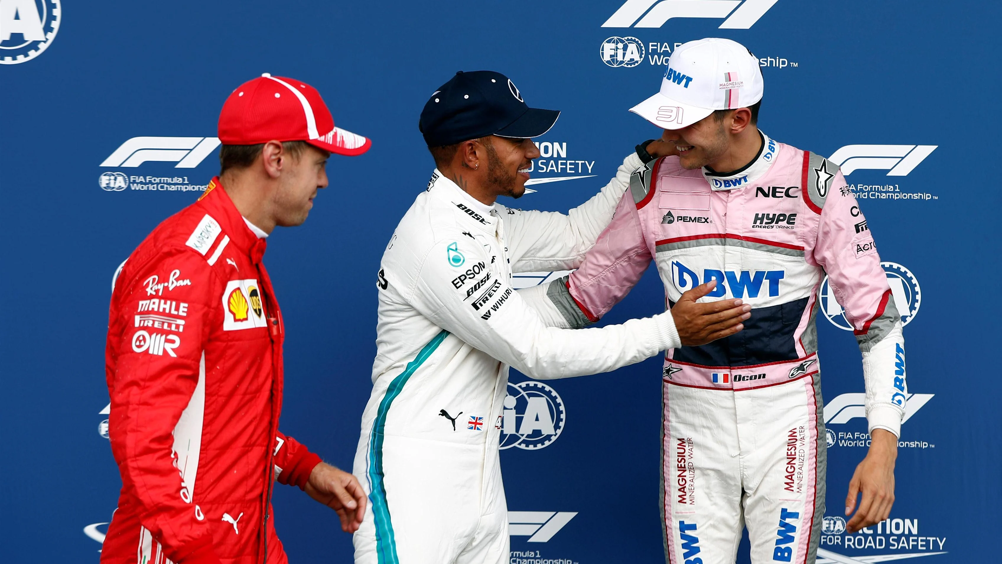 Sebastian Vettel, Ferrari, Lewis Hamilton, Mercedes AMG F1 and Esteban Ocon, Racing Point Force India F1 Team celebrate in parc ferme at Formula One World Championship, Rd13, Belgian Grand Prix, Qualifying, Spa Francorchamps, Belgium, Saturday 25 August 2018. © Glenn Dunbar/LAT/Sutton Images