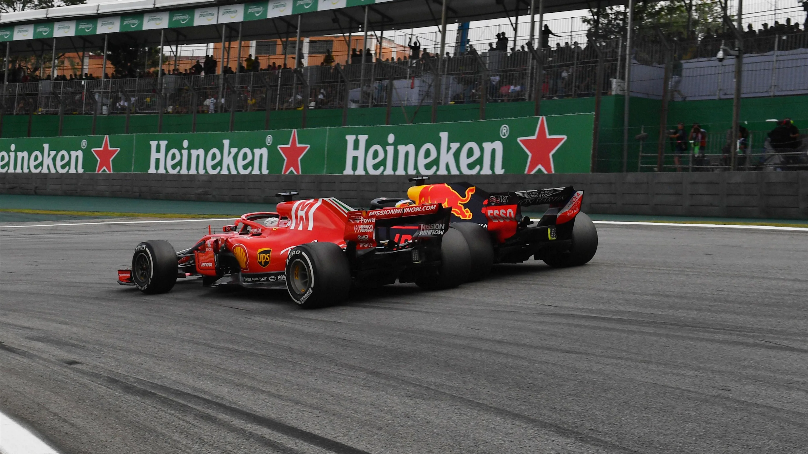 Sebastian Vettel, Ferrari SF71H and Daniel Ricciardo, Red Bull Racing RB14 battle at Formula One World Championship, Rd20, Brazilian Grand Prix, Race, Interlagos, Sao Paulo, Brazil, Sunday 11 November 2018.