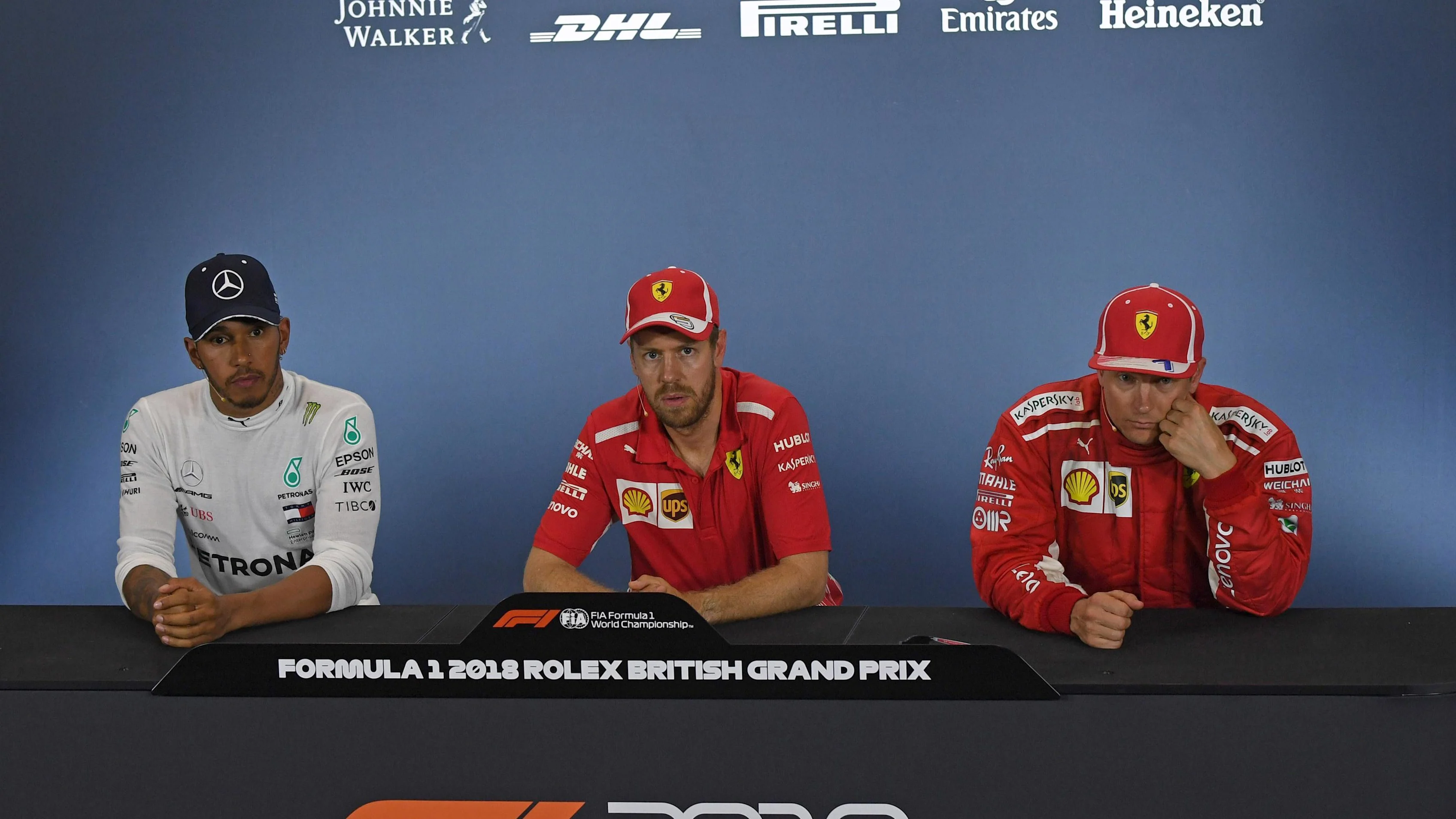 (L to R): Lewis Hamilton (GBR) Mercedes-AMG F1, Sebastian Vettel (GER) Ferrari, Kimi Raikkonen