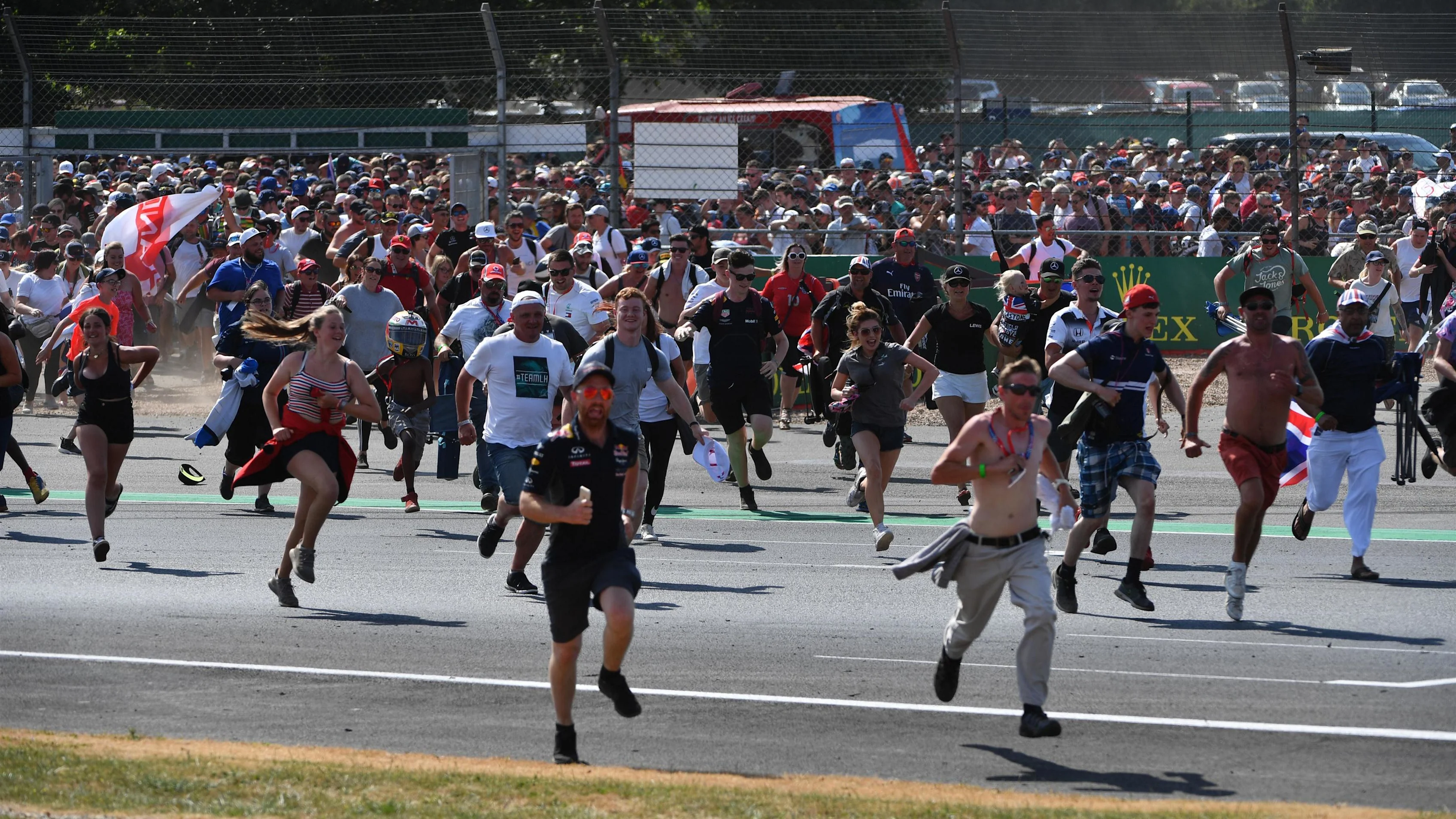 Fans invade the track at Formula One World Championship, Rd10, British Grand Prix, Race,
