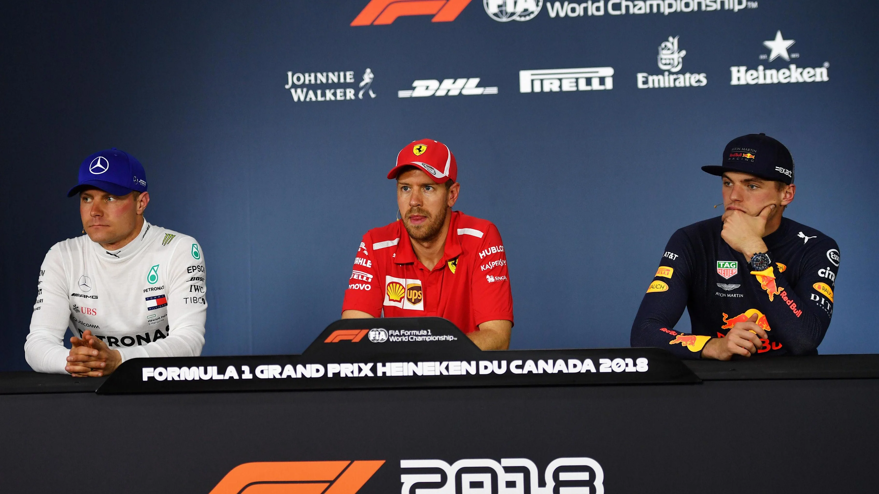 (L to R): Valtteri Bottas (FIN) Mercedes-AMG F1, Sebastian Vettel (GER) Ferrari and Max Verstappen