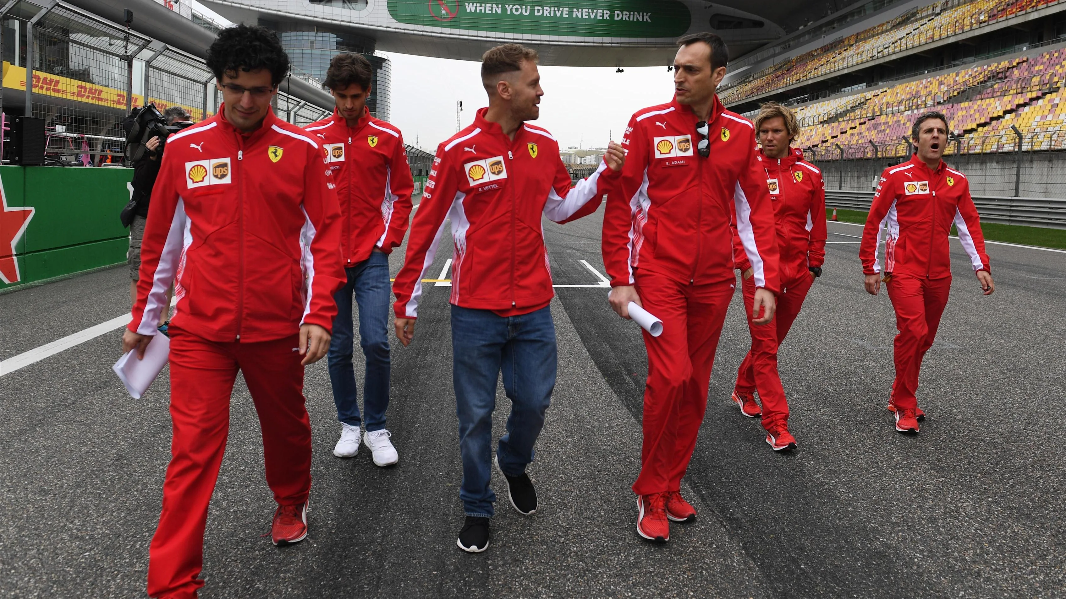 Sebastian Vettel (GER) Ferrari walks the track with Riccardo Adami (ITA) Ferrari Race Engineer at Formula One World Championship, Rd3, Chinese Grand Prix, Preparations, Shanghai, China, Thursday 12 April 2018. © Mark Sutton/Sutton Images