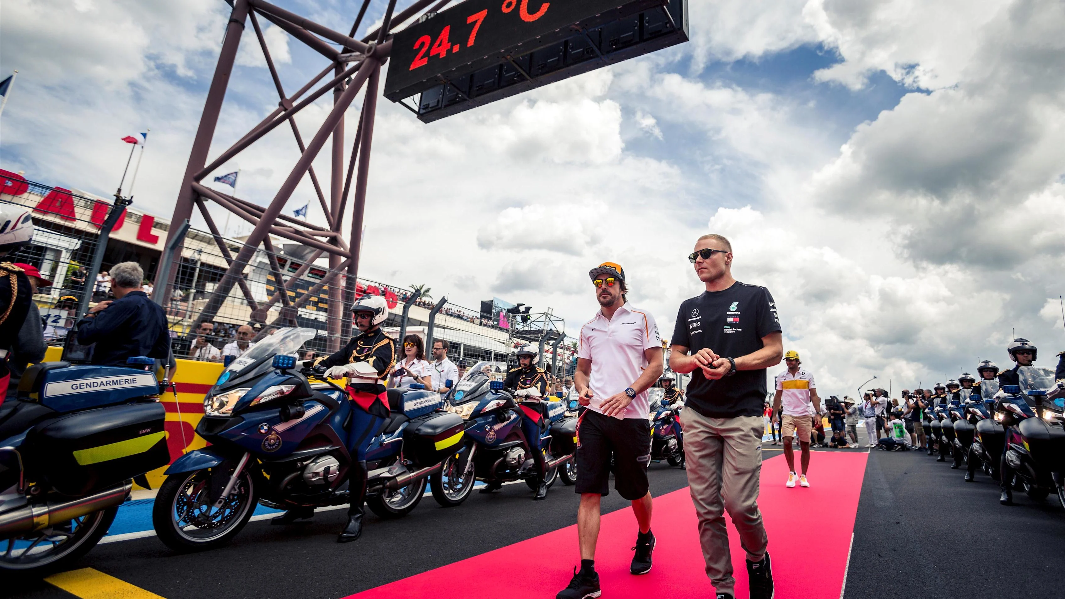 Fernando Alonso (ESP) McLaren and Valtteri Bottas (FIN) Mercedes-AMG F1 on the drivers parade at