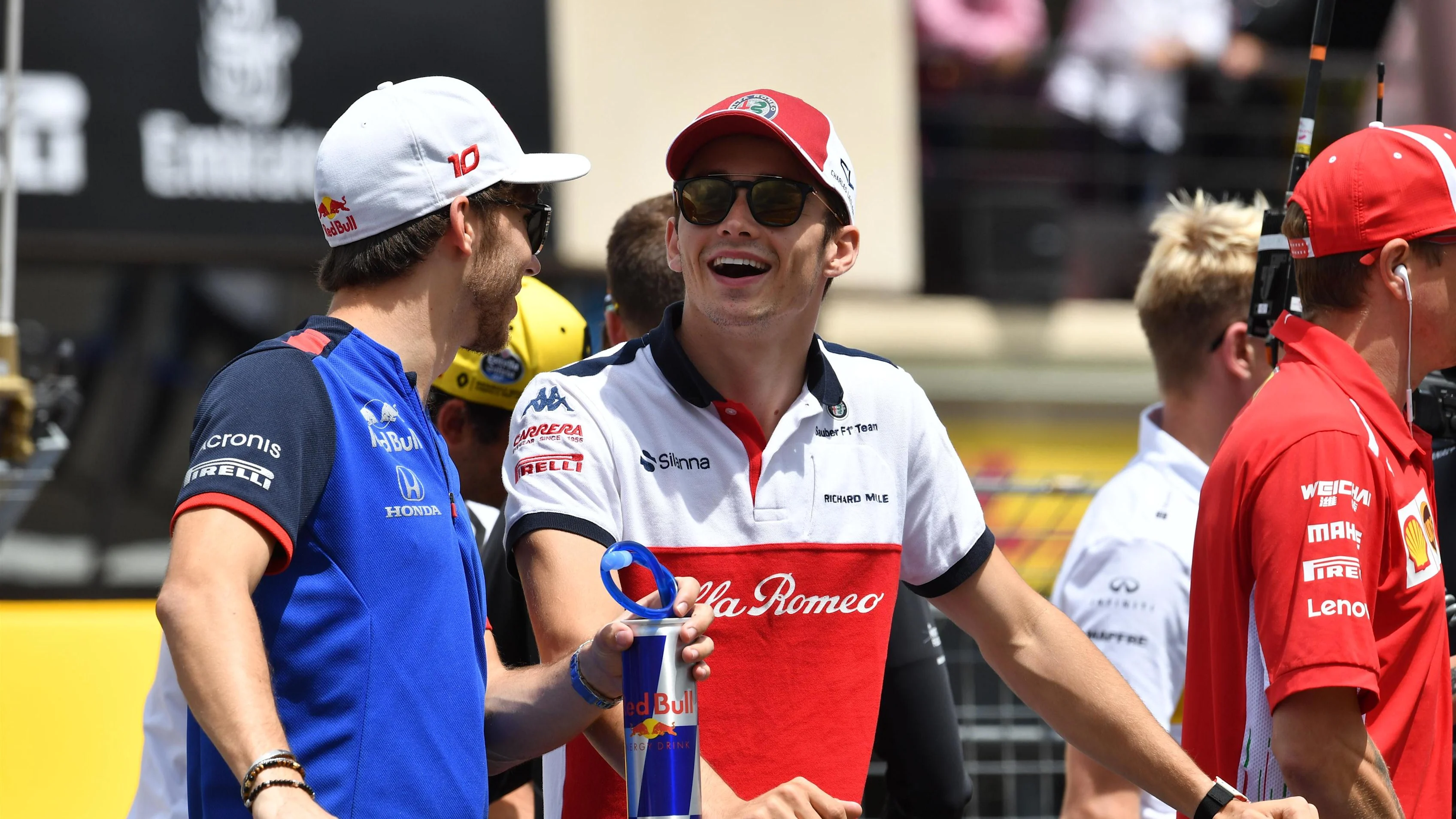 Pierre Gasly (FRA) Scuderia Toro Rosso and Charles Leclerc (MON) Alfa Romeo Sauber F1 Team on the