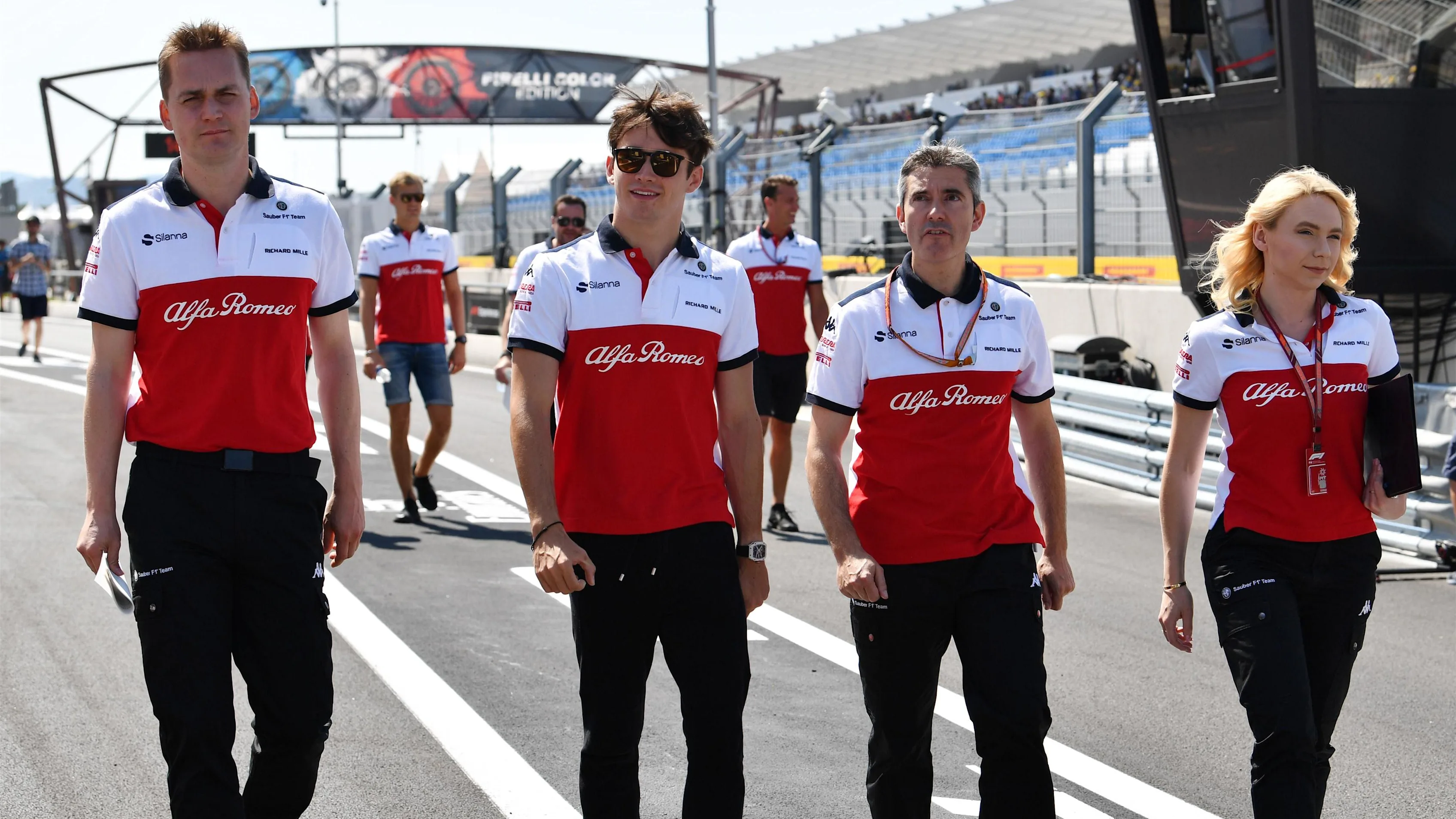 Charles Leclerc (MON) Alfa Romeo Sauber F1 Team walks the track with Xevi Pujolar (ESP) Alfa Romeo Sauber F1 Team Head of Track Engineering and Ruth Buscombe (GBR) Alfa Romeo Sauber F1 Team Race Strategist at Formula One World Championship, Rd8, French Gr