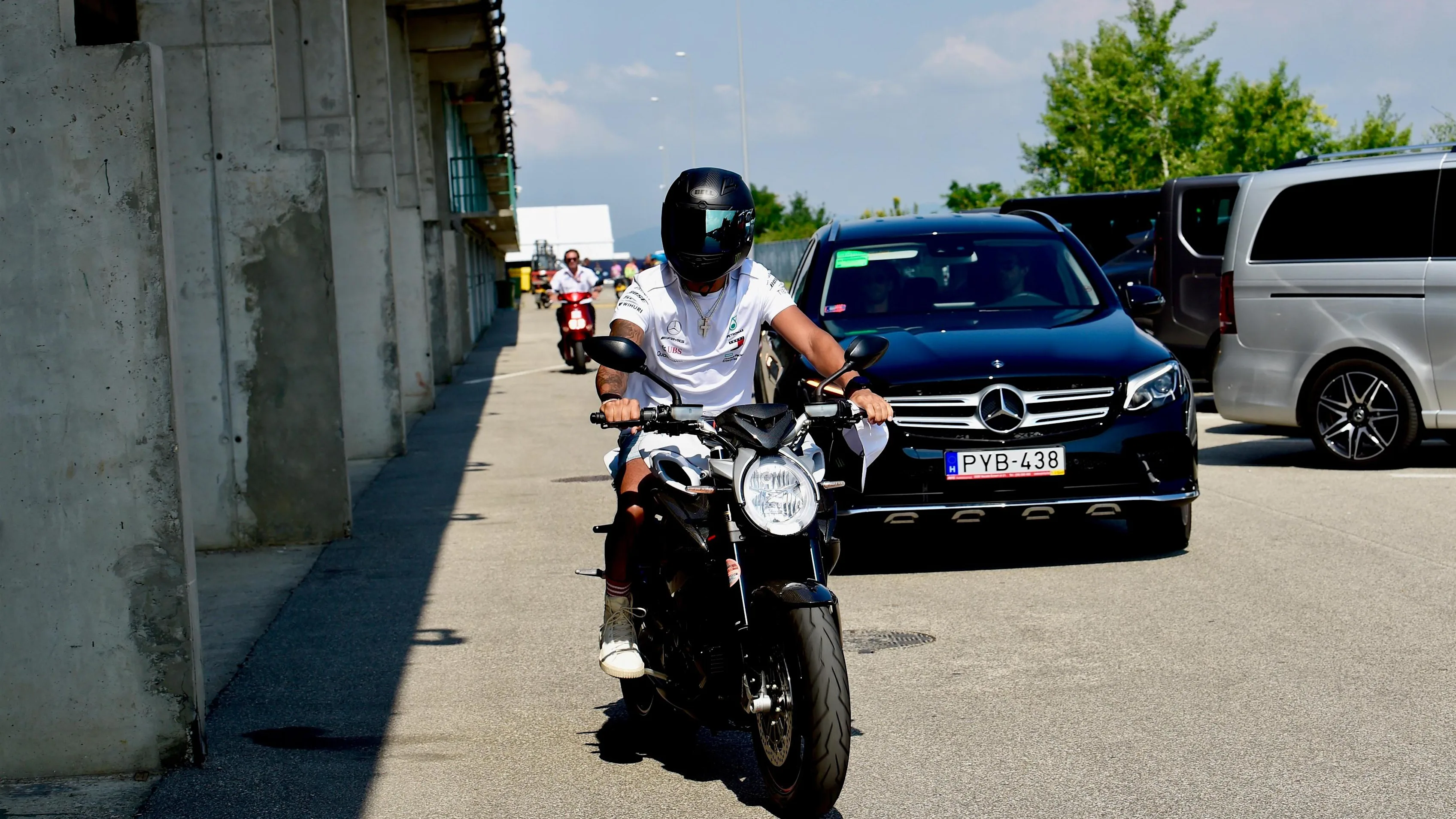 Lewis Hamilton (GBR) Mercedes-AMG F1 on his MV Agusta motorbike at Formula One World Championship, Rd12, Hungarian Grand Prix, Qualifying, Hungaroring, Hungary, Saturday 28 July 2018. © Jerry Andre/Sutton Images
