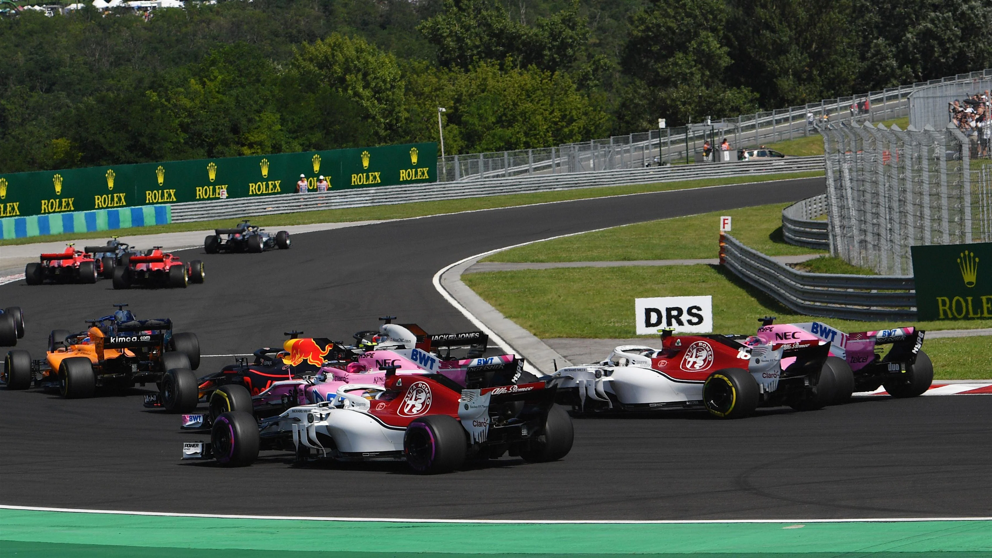 Marcus Ericsson (SWE) Alfa Romeo Sauber C37 and Charles Leclerc (MON) Alfa Romeo Sauber C37 at the start of the race at Formula One World Championship, Rd12, Hungarian Grand Prix, Race, Hungaroring, Hungary, Sunday 29 July 2018. © Jerry Andre/Sutton Images