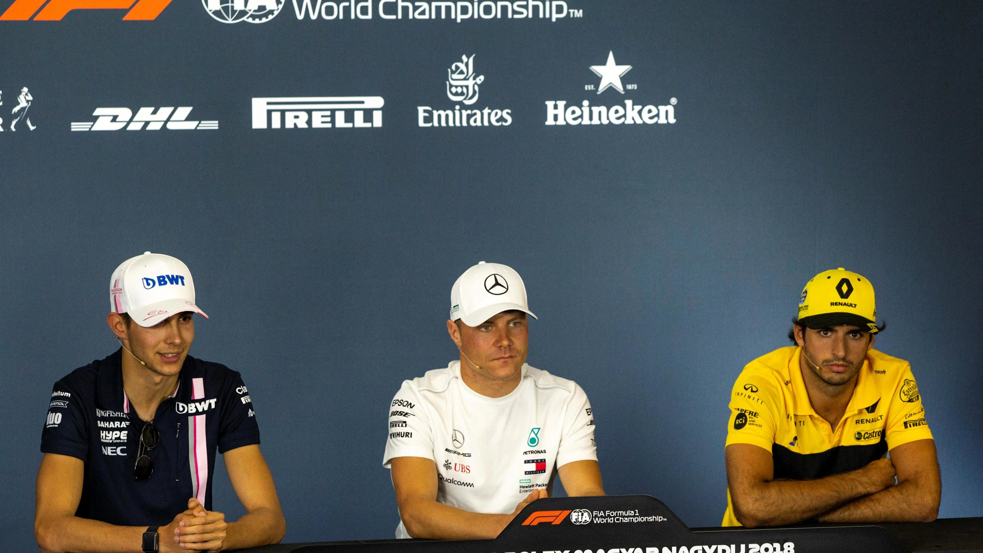 (L to R): Esteban Ocon (FRA) Force India F1, Valtteri Bottas (FIN) Mercedes-AMG F1 and Carlos Sainz jr (ESP) Renault Sport F1 Team in the Press Conference at Formula One World Championship, Rd12, Hungarian Grand Prix, Preparations, Hungaroring, Hungary, Thursday 26 July 2018. © Manuel Goria/Sutton Images