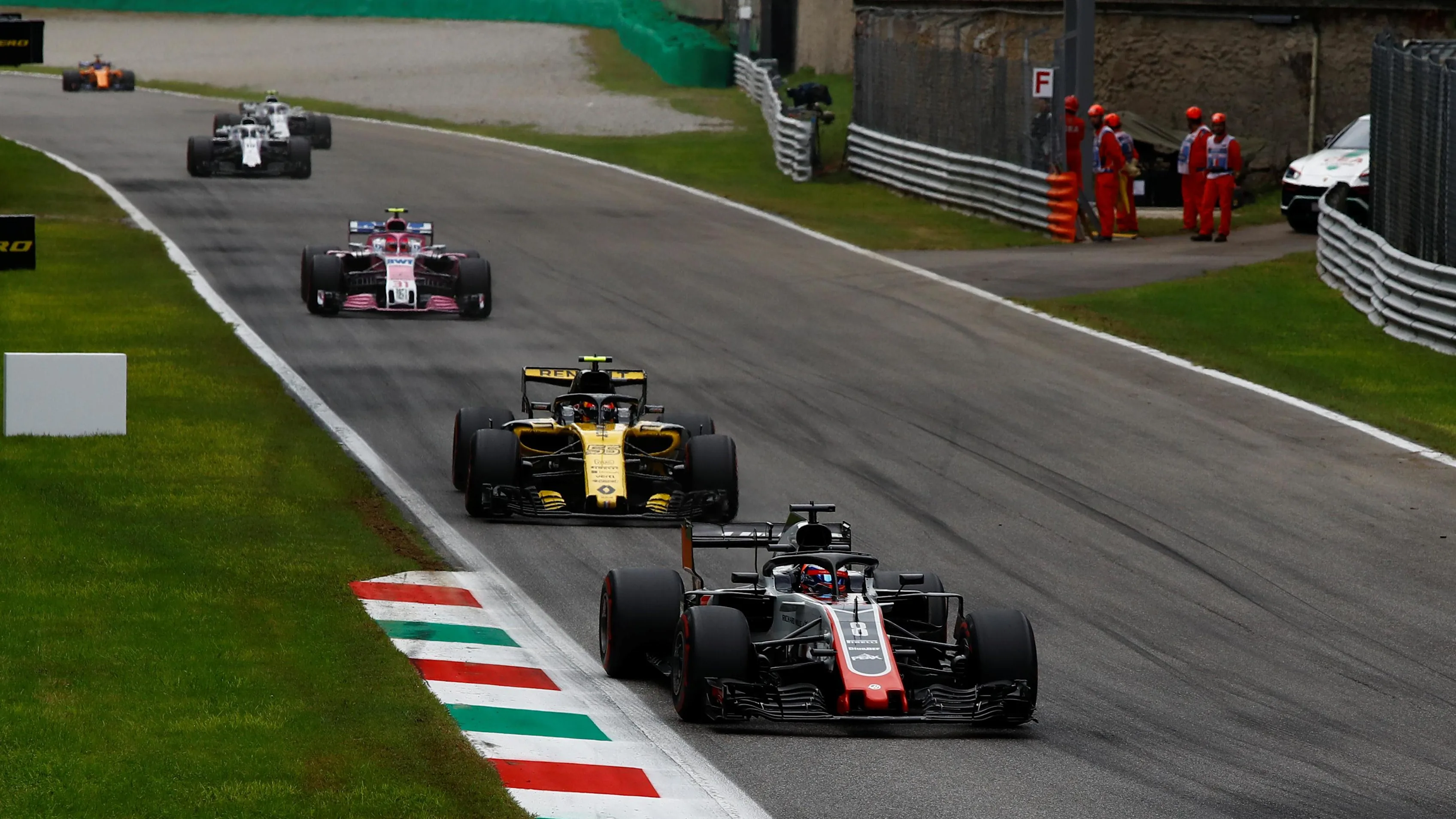 Romain Grosjean, Haas F1 Team VF-18, Carlos Sainz Jr, Renault Sport F1 Team R.S. 18 and Esteban
