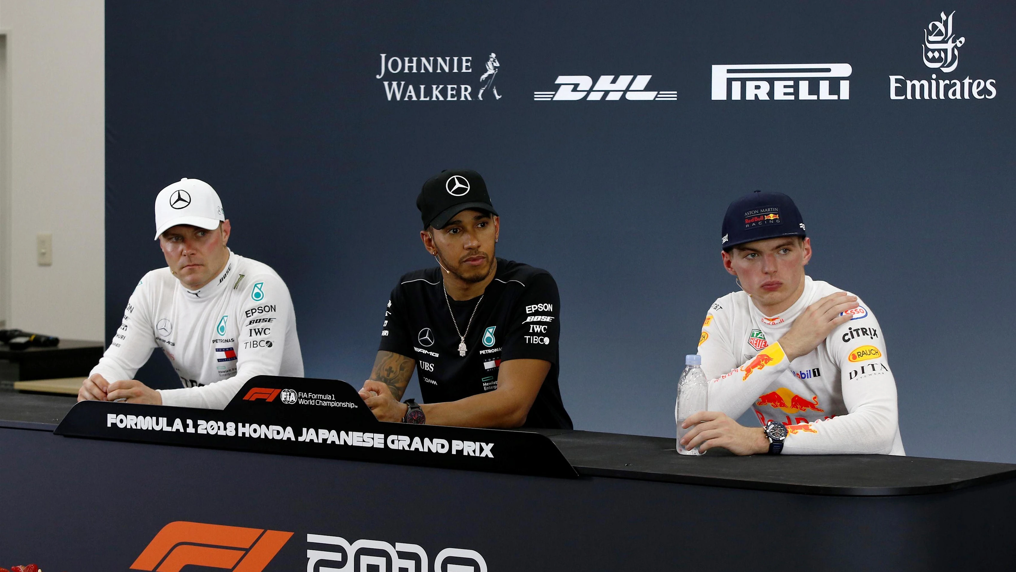 (L to R): Valtteri Bottas, Mercedes AMG F1, Lewis Hamilton, Mercedes AMG F1 and Max Verstappen, Red