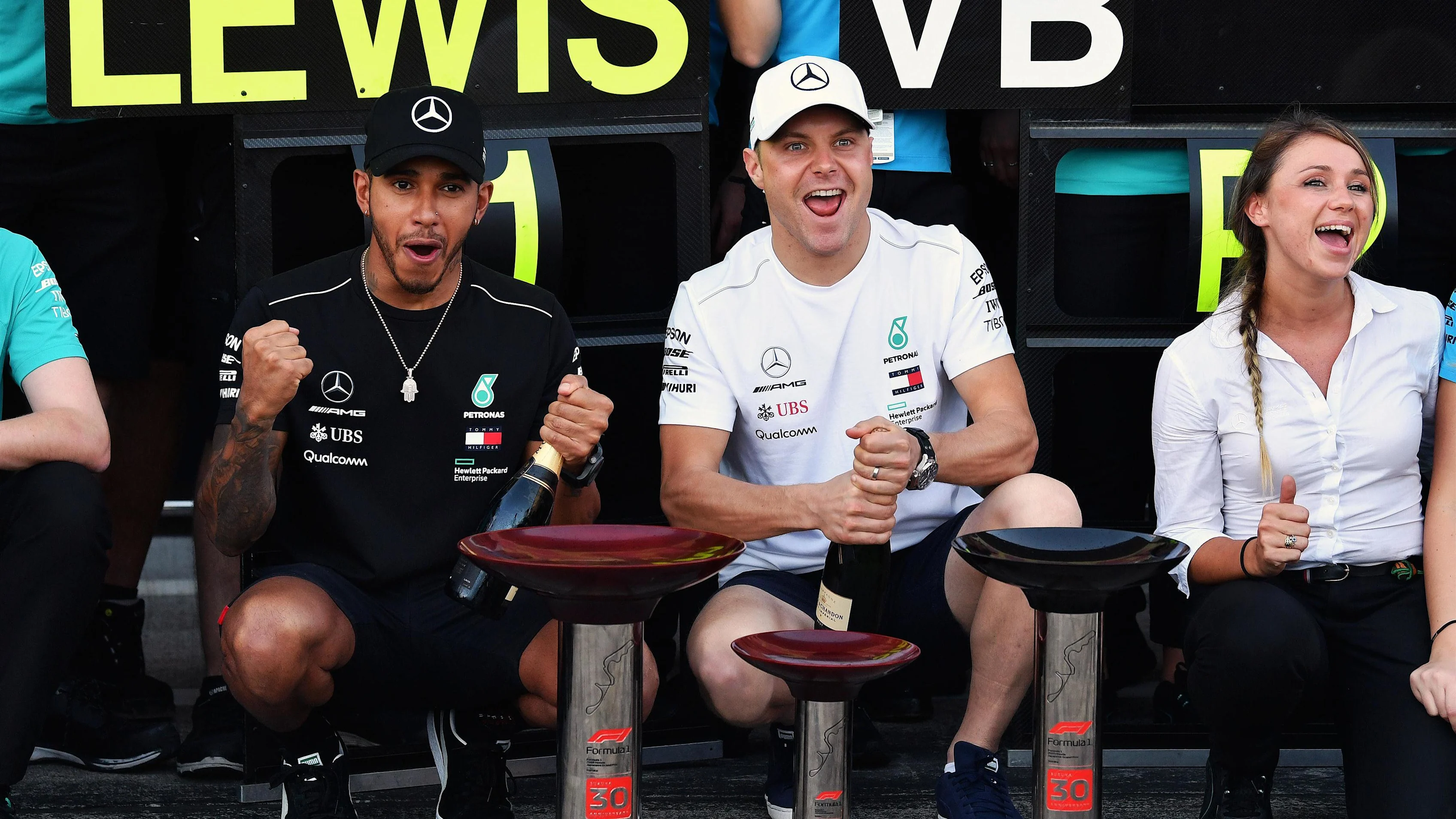Lewis Hamilton, Mercedes AMG F1 and Valtteri Bottas, Mercedes AMG F1 celebrate with the team at