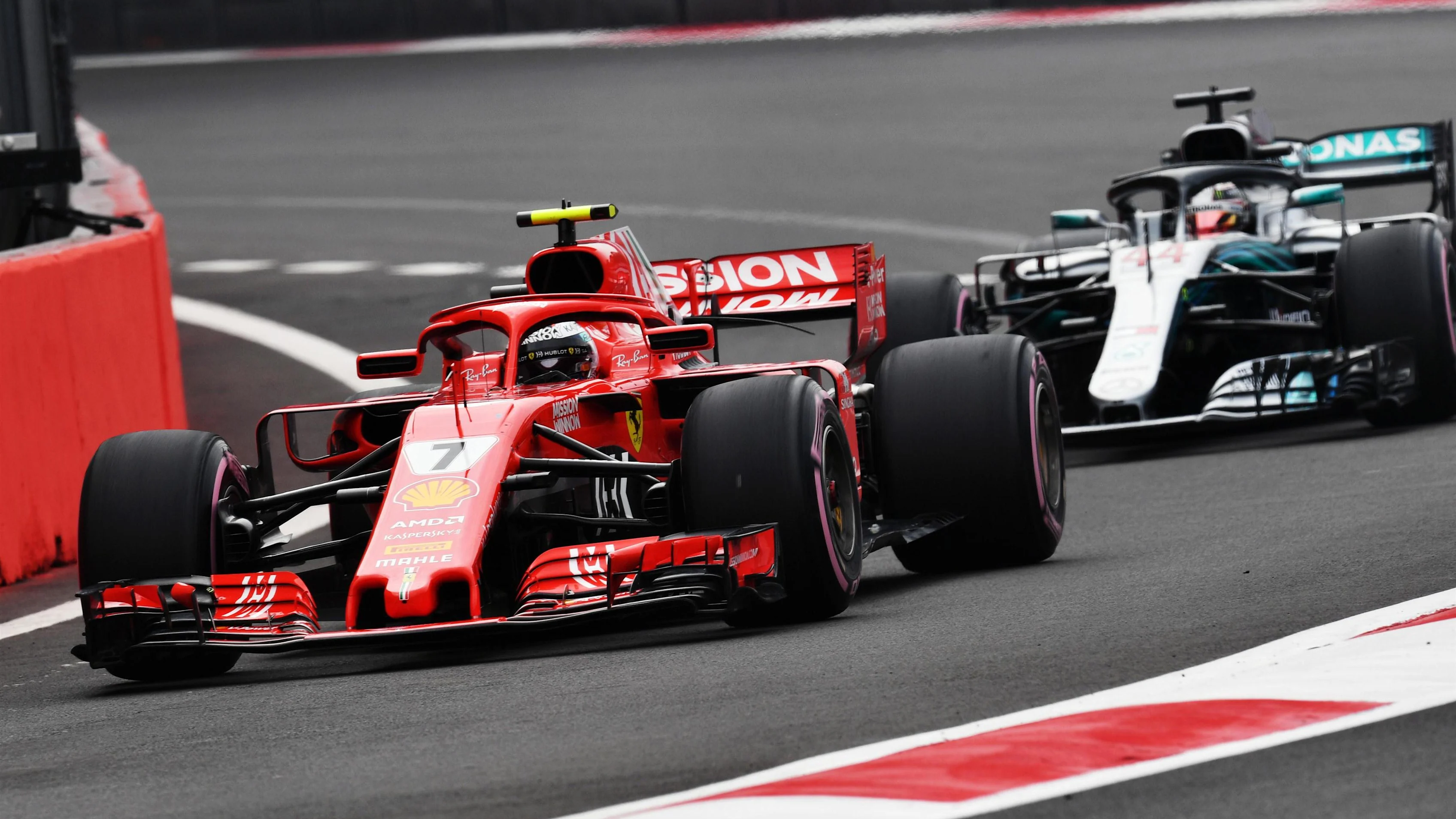 Kimi Raikkonen, Ferrari SF71H and Lewis Hamilton, Mercedes AMG F1 W09 EQ Power+ at Formula One