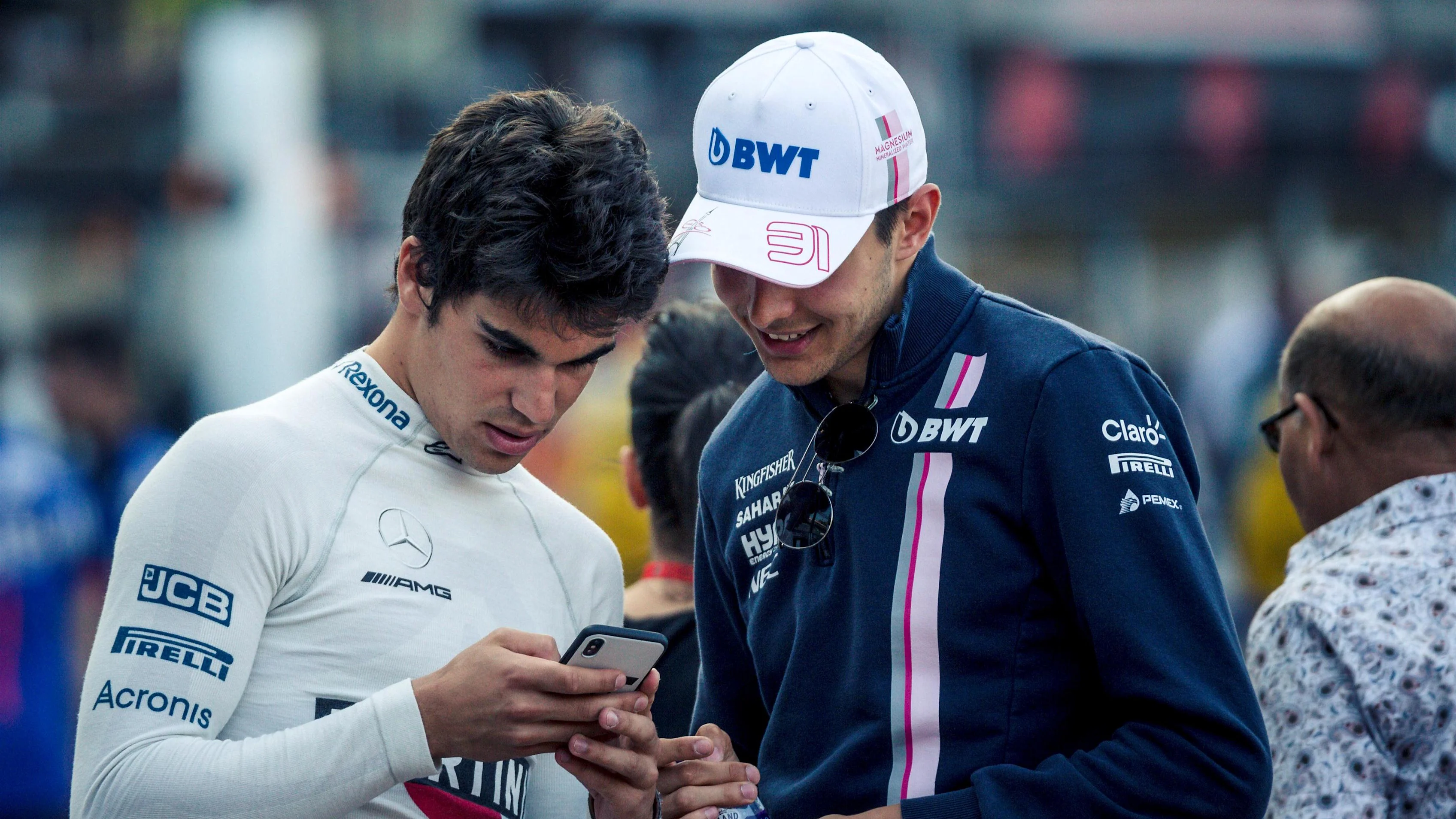 Lance Stroll (CDN) Williams and Esteban Ocon (FRA) Force India F1 at Formula One World