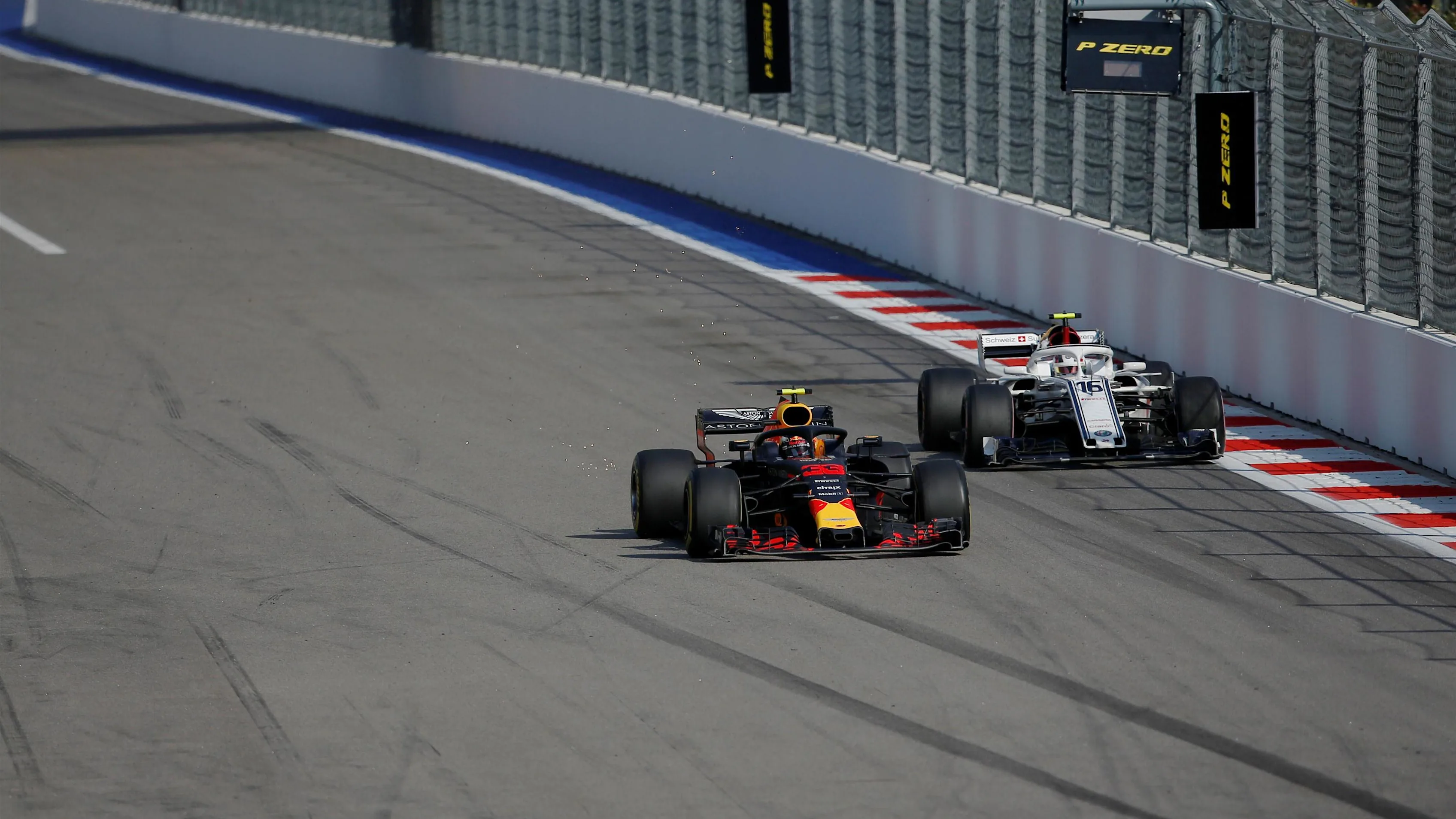 Max Verstappen, Red Bull Racing RB14 and Charles Leclerc, Alfa Romeo Sauber C37 at Formula One World Championship, Rd16, Russian Grand Prix, Race, Sochi Autodrom, Sochi, Krasnodar Krai, Russia, Sunday 30 September 2018.