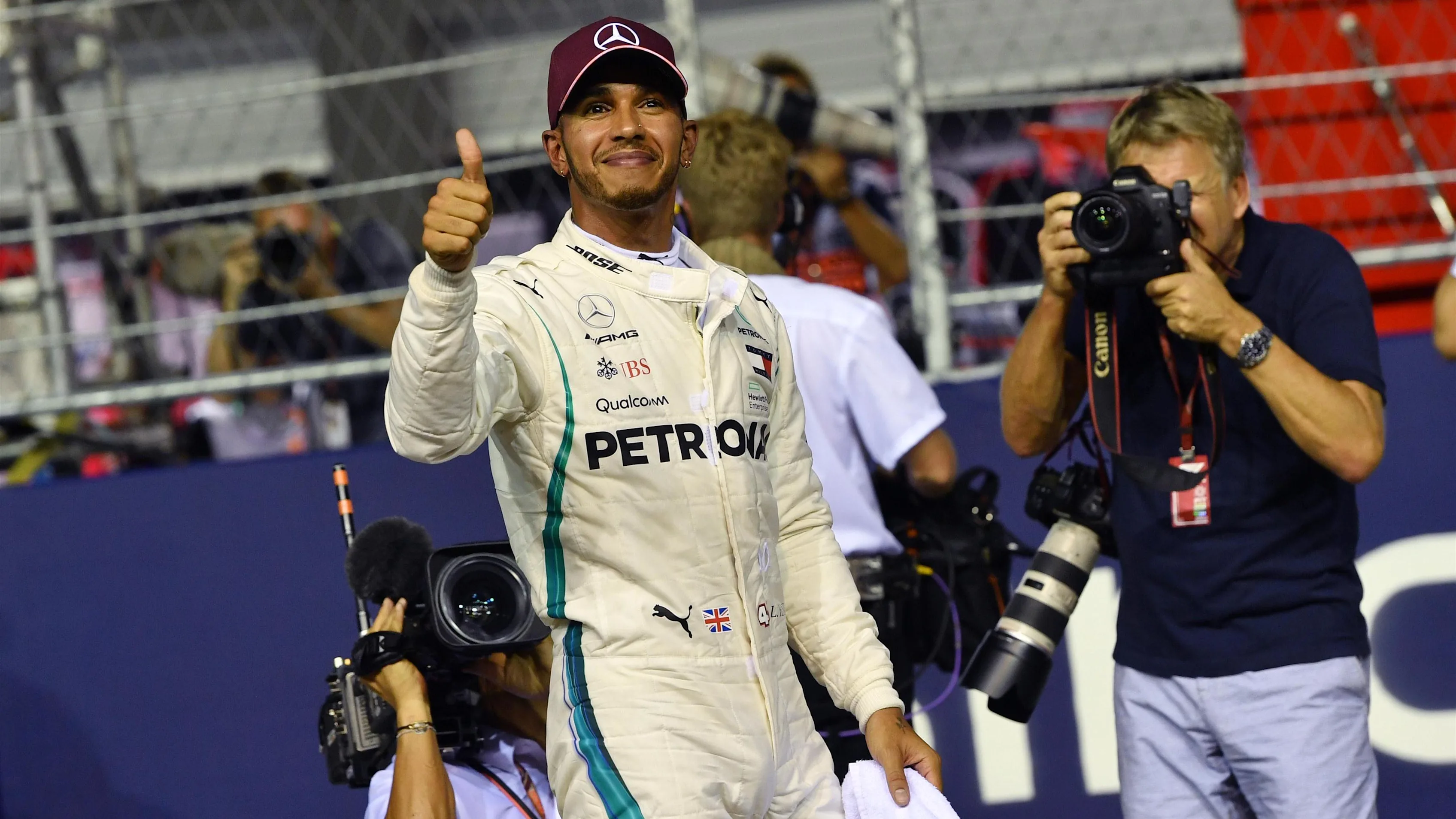 Pole sitter Lewis Hamilton, Mercedes AMG F1 celebrates in parc ferme at Formula One World Championship, Rd15, Singapore Grand Prix, Qualifying, Marina Bay Circuit, Singapore, Saturday 15 September 2018.