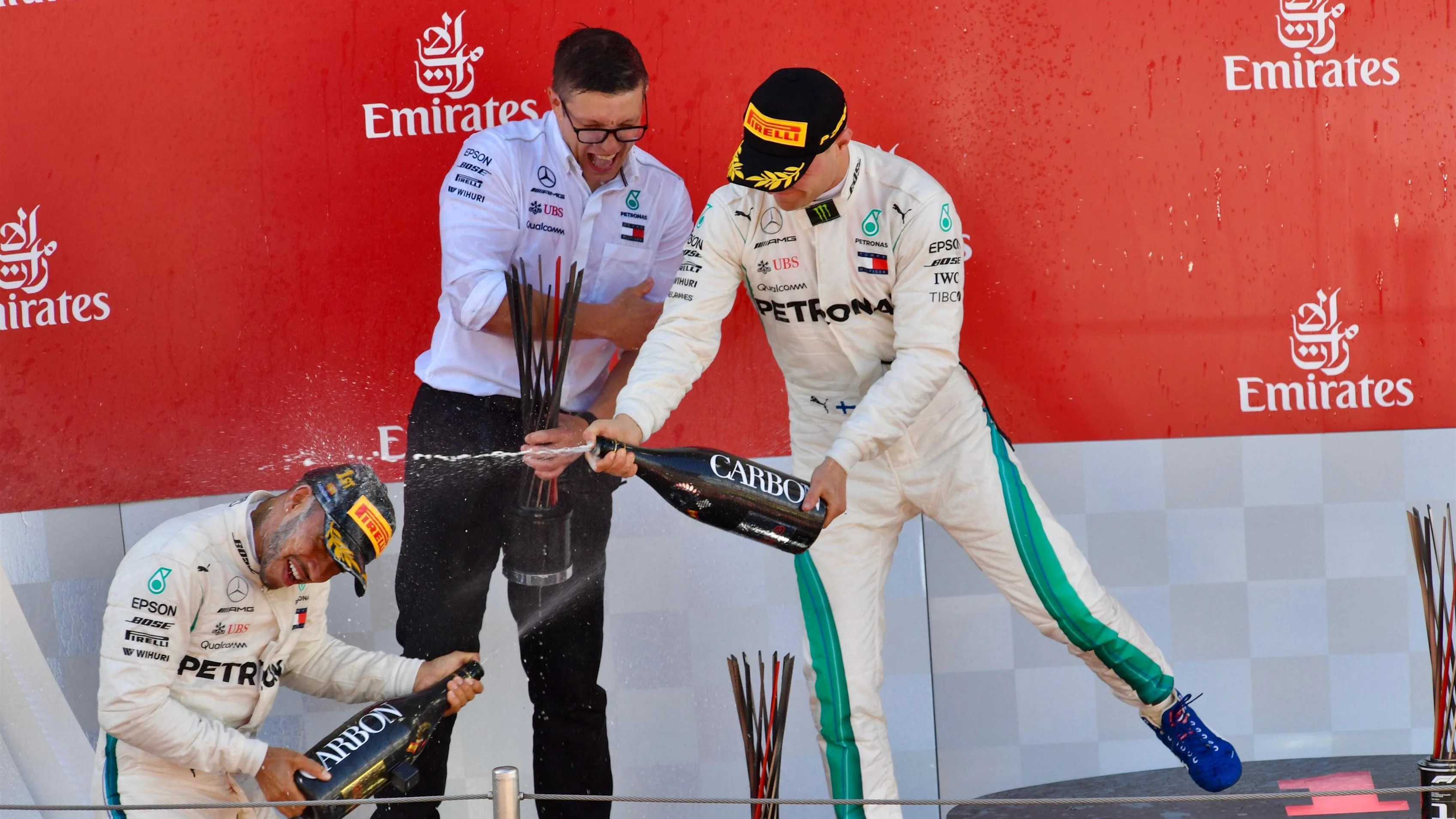 Lewis Hamilton (GBR) Mercedes-AMG F1 and Valtteri Bottas (FIN) Mercedes-AMG F1 celebrate on the podium with the champagne at Formula One World Championship, Rd5, Spanish Grand Prix, Race, Barcelona, Spain, Sunday 13 May 2018. © Jerry Andre/Sutton Images