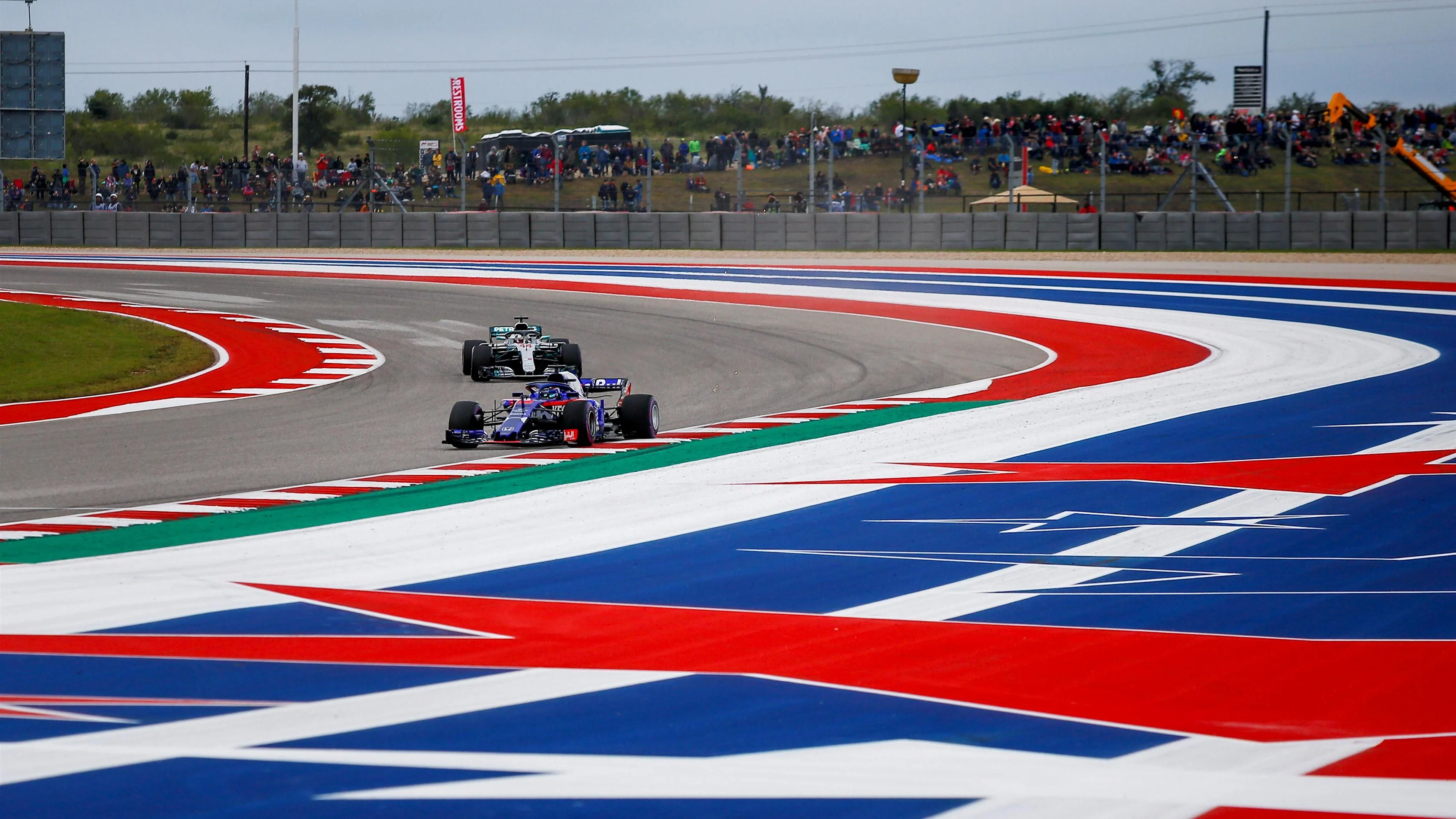 Brendon Hartley, Scuderia Toro Rosso STR13 and Lewis Hamilton, Mercedes AMG F1 W09 EQ Power+ at