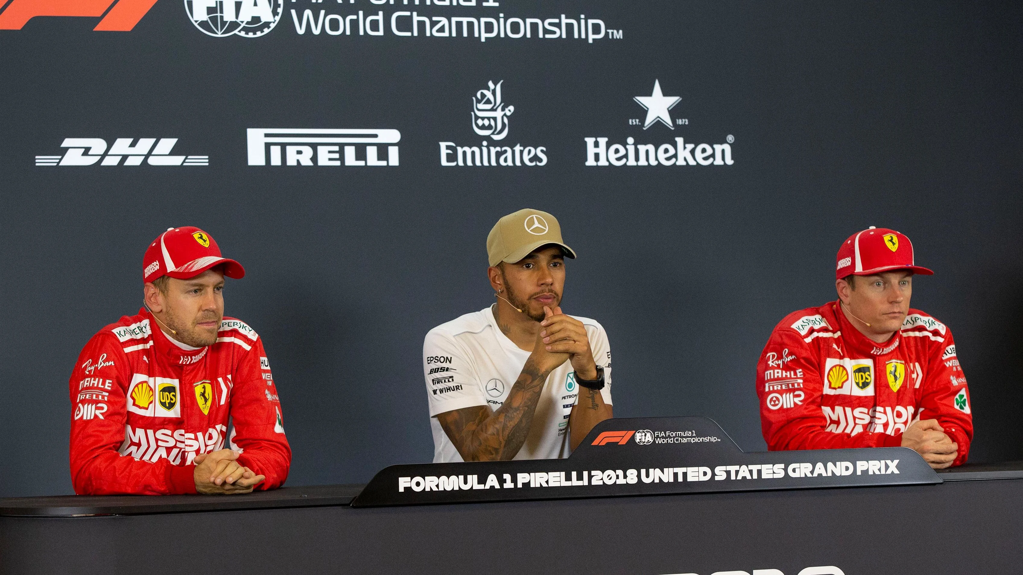 (L to R): Sebastian Vettel, Ferrari, Lewis Hamilton, Mercedes AMG F1 and Kimi Raikkonen, Ferrari in