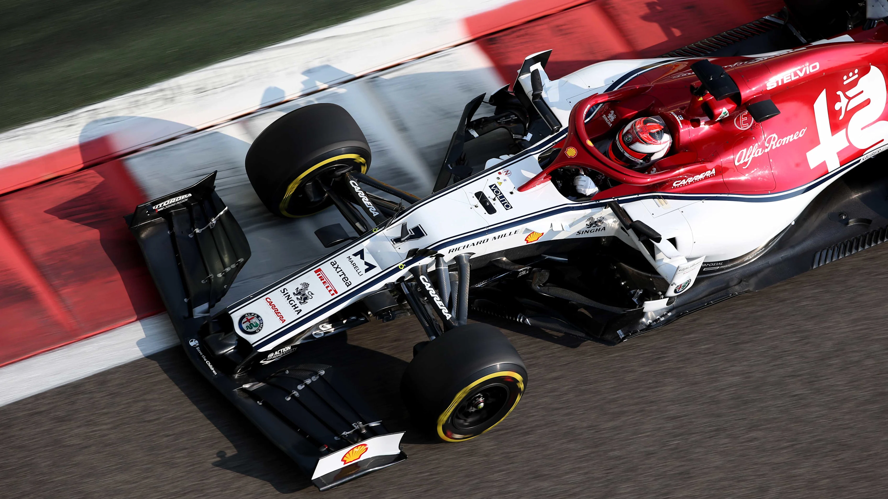 ABU DHABI, UNITED ARAB EMIRATES - NOVEMBER 30: Kimi Raikkonen of Finland driving the (7) Alfa Romeo