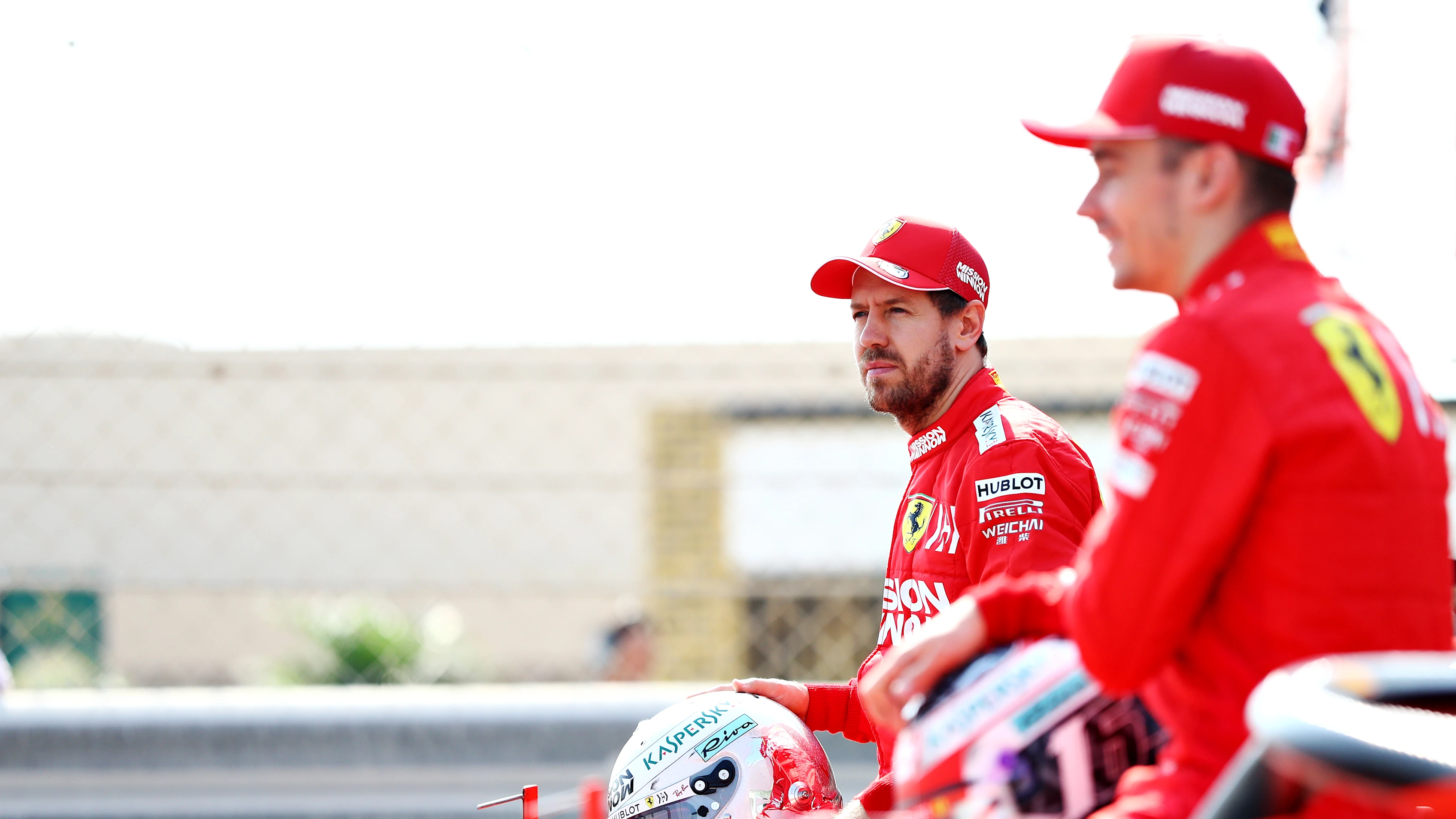 ABU DHABI, UNITED ARAB EMIRATES - NOVEMBER 30: Sebastian Vettel of Germany and Ferrari and Charles