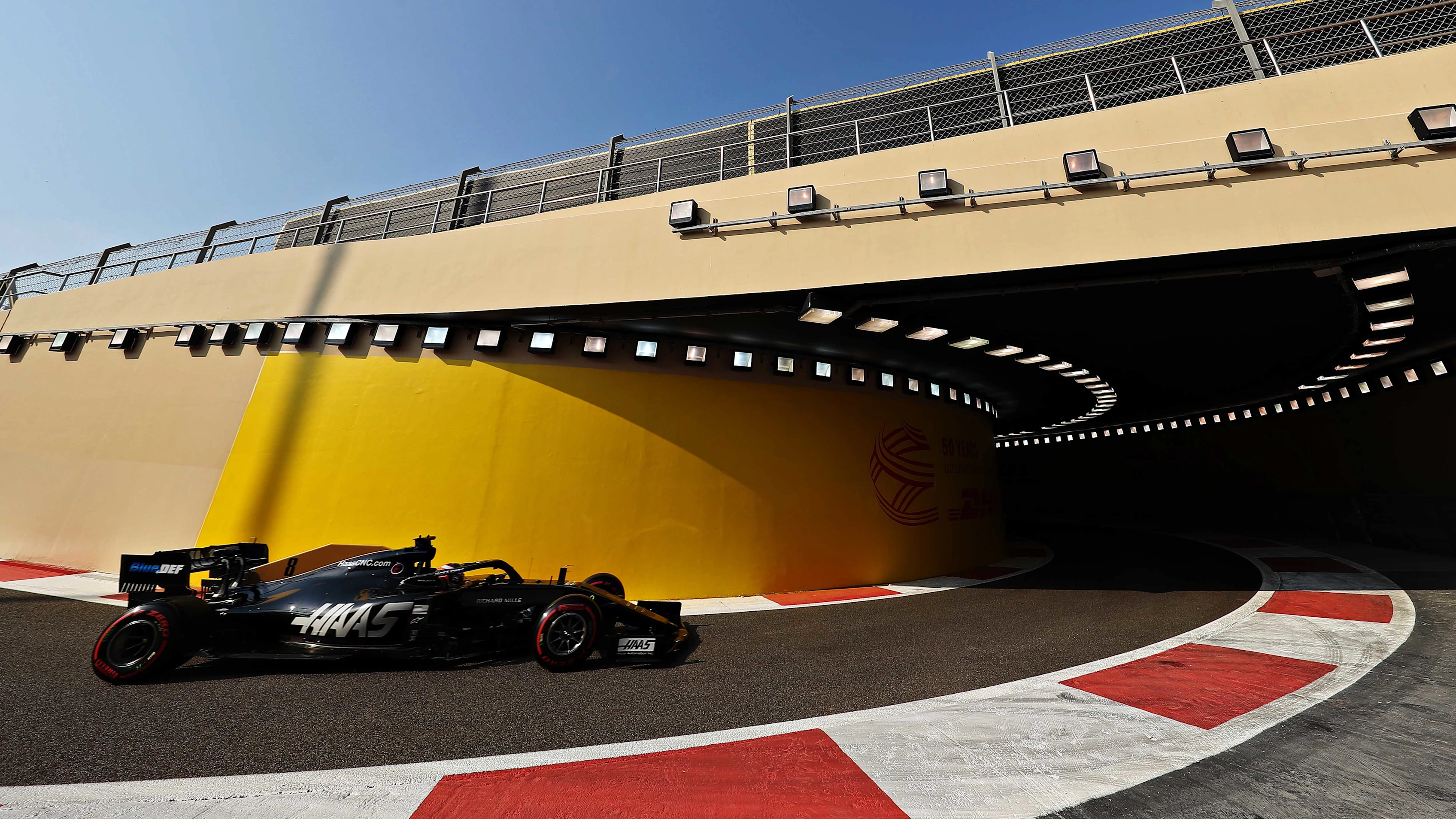 ABU DHABI, UNITED ARAB EMIRATES - NOVEMBER 30: Romain Grosjean of France driving the (8) Haas F1 Team VF-19 Ferrari leaves the pitlane during final practice for the F1 Grand Prix of Abu Dhabi at Yas Marina Circuit on November 30, 2019 in Abu Dhabi, United Arab Emirates. (Photo by Mark Thompson/Getty Images)