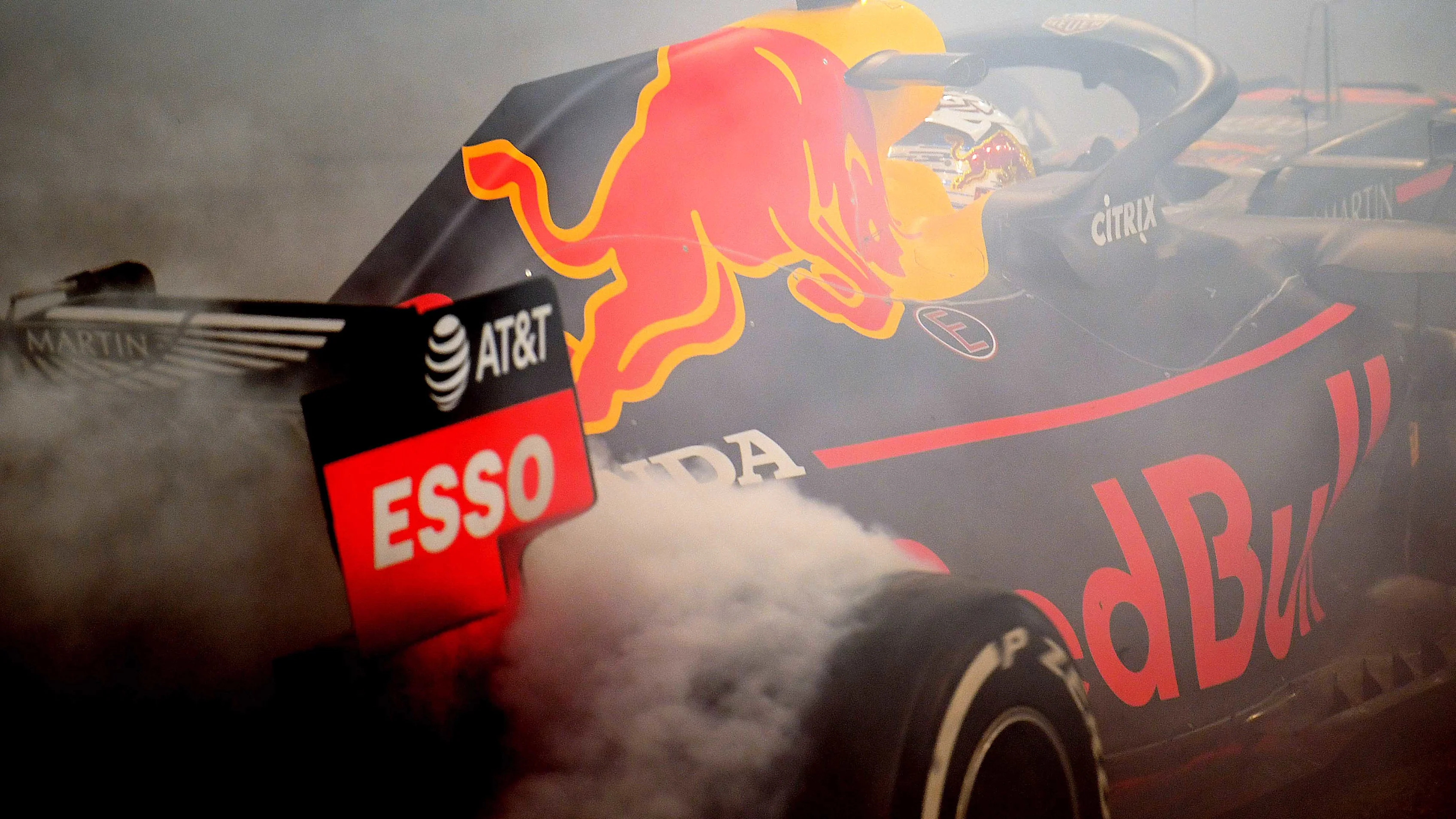 ABU DHABI, UNITED ARAB EMIRATES - DECEMBER 01: Second placed Max Verstappen of Netherlands and Red Bull Racing celebrates with donuts on track during the F1 Grand Prix of Abu Dhabi at Yas Marina Circuit on December 01, 2019 in Abu Dhabi, United Arab Emirates. (Photo by Clive Mason/Getty Images)