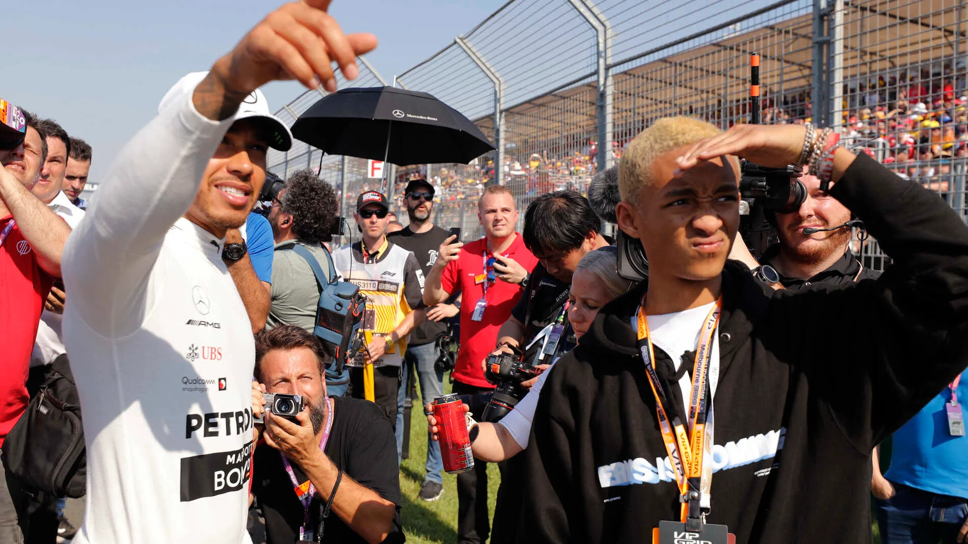 MELBOURNE GRAND PRIX CIRCUIT, AUSTRALIA - MARCH 17: Lewis Hamilton, Mercedes AMG F1, with Jaden