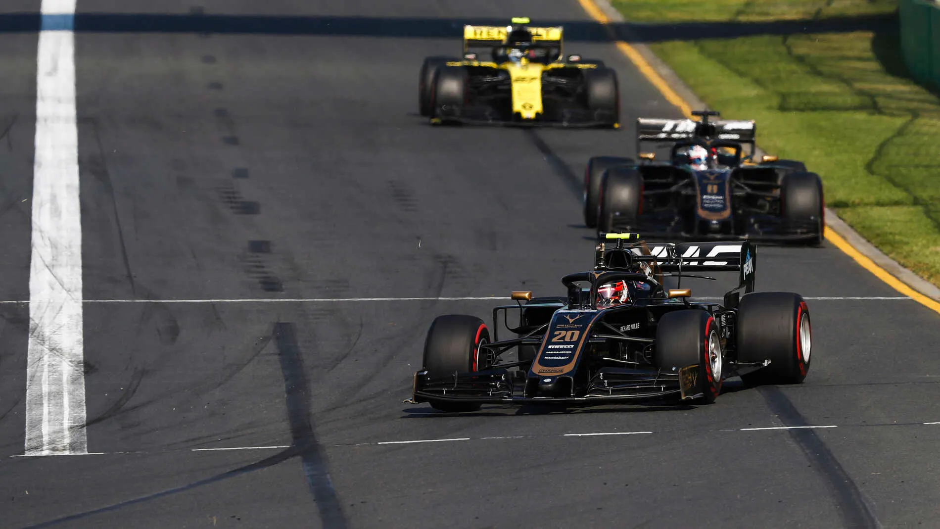 MELBOURNE GRAND PRIX CIRCUIT, AUSTRALIA - MARCH 17: Kevin Magnussen, Haas VF-19, leads Romain