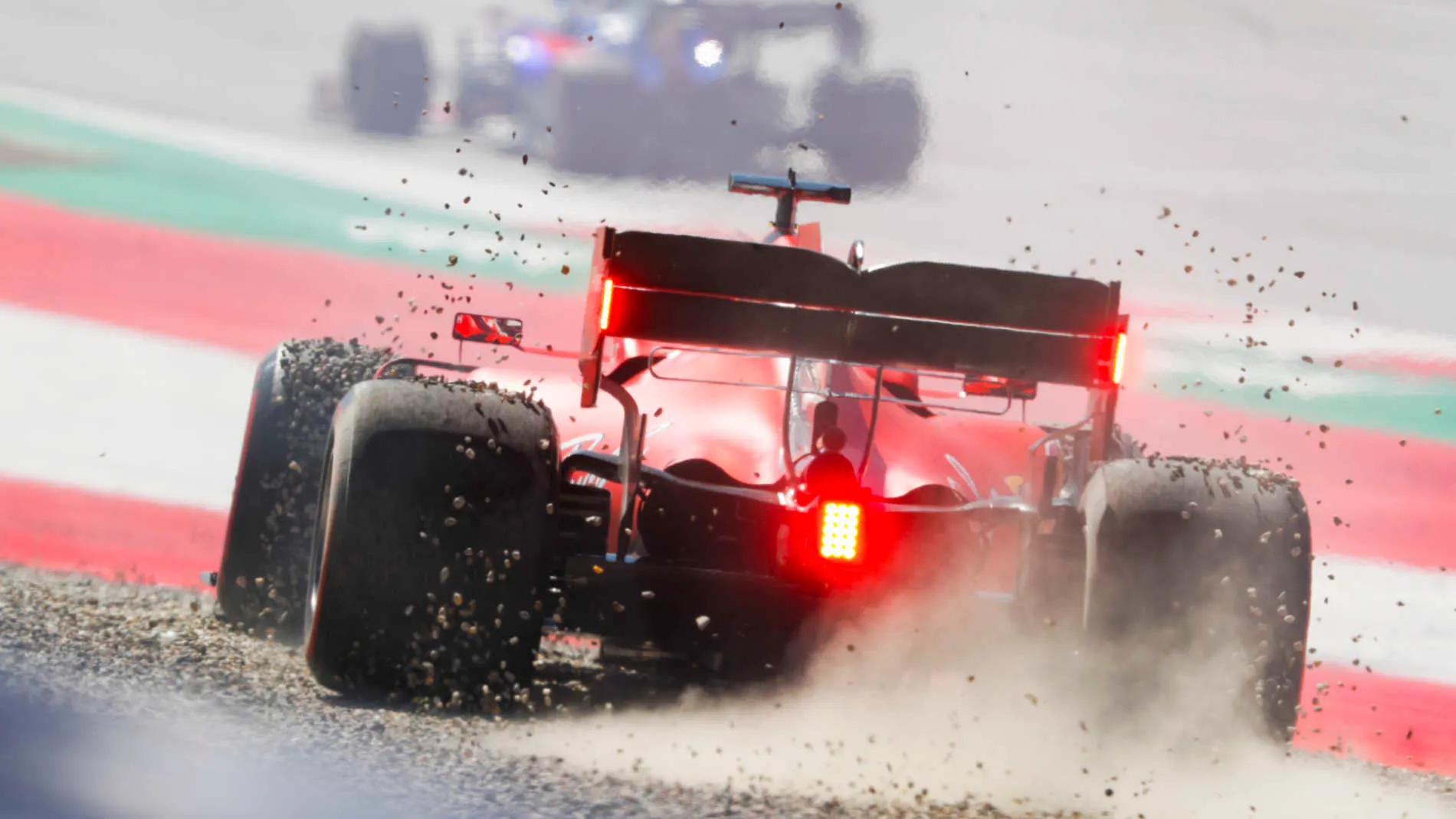 RED BULL RING, AUSTRIA - JUNE 28: Sebastian Vettel, Ferrari SF90 going across gravel during the Austrian GP at Red Bull Ring on June 28, 2019 in Red Bull Ring, Austria. (Photo by Steven Tee / LAT Images)