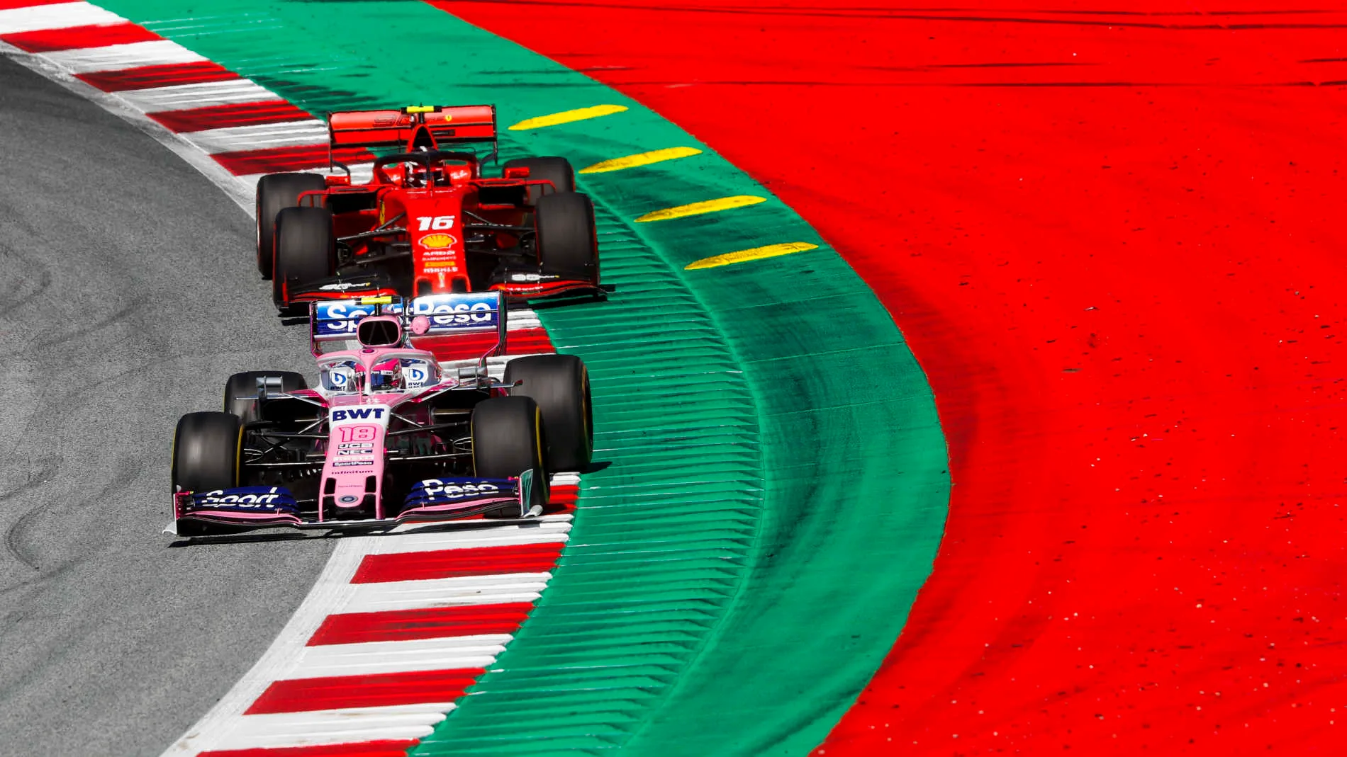 RED BULL RING, AUSTRIA - JUNE 28: Lance Stroll, Racing Point RP19, leads Charles Leclerc, Ferrari